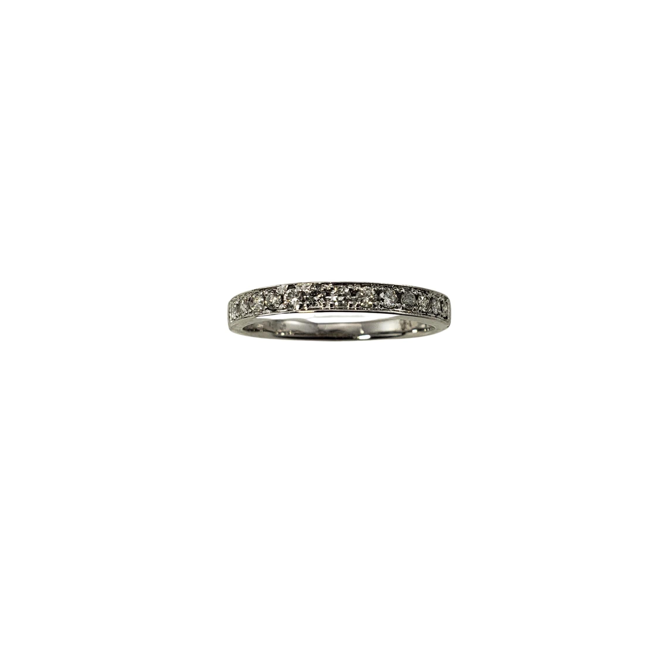14 Karat White Gold Diamond Wedding Band Ring Size 7.5-

This sparkling band features 13 round brilliant cut diamonds set in classic 14K white gold.  Width:  3 mm.  Shank:  2 mm.

Approximate total diamond weight:  .26 ct.

Diamond color: I

Diamond