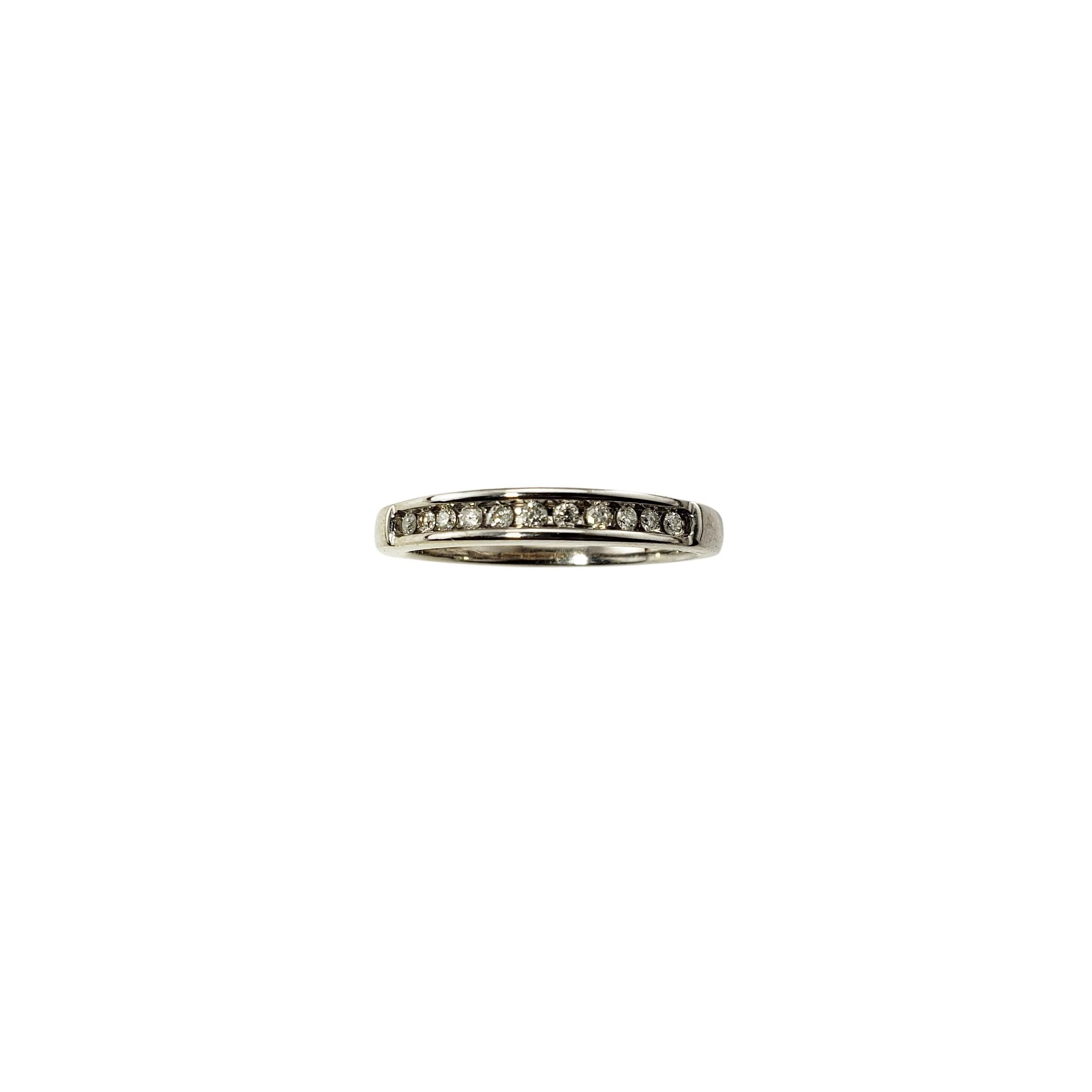 14 Karat White Gold Diamond Wedding Band Ring Size 8.5-

This sparkling wedding band features 11 round brilliant cut diamonds set in classic 14K white gold.  Width:  3 mm.  Shank:  2 mm.

Approximate total diamond weight:  .22 ct.

Diamond color: