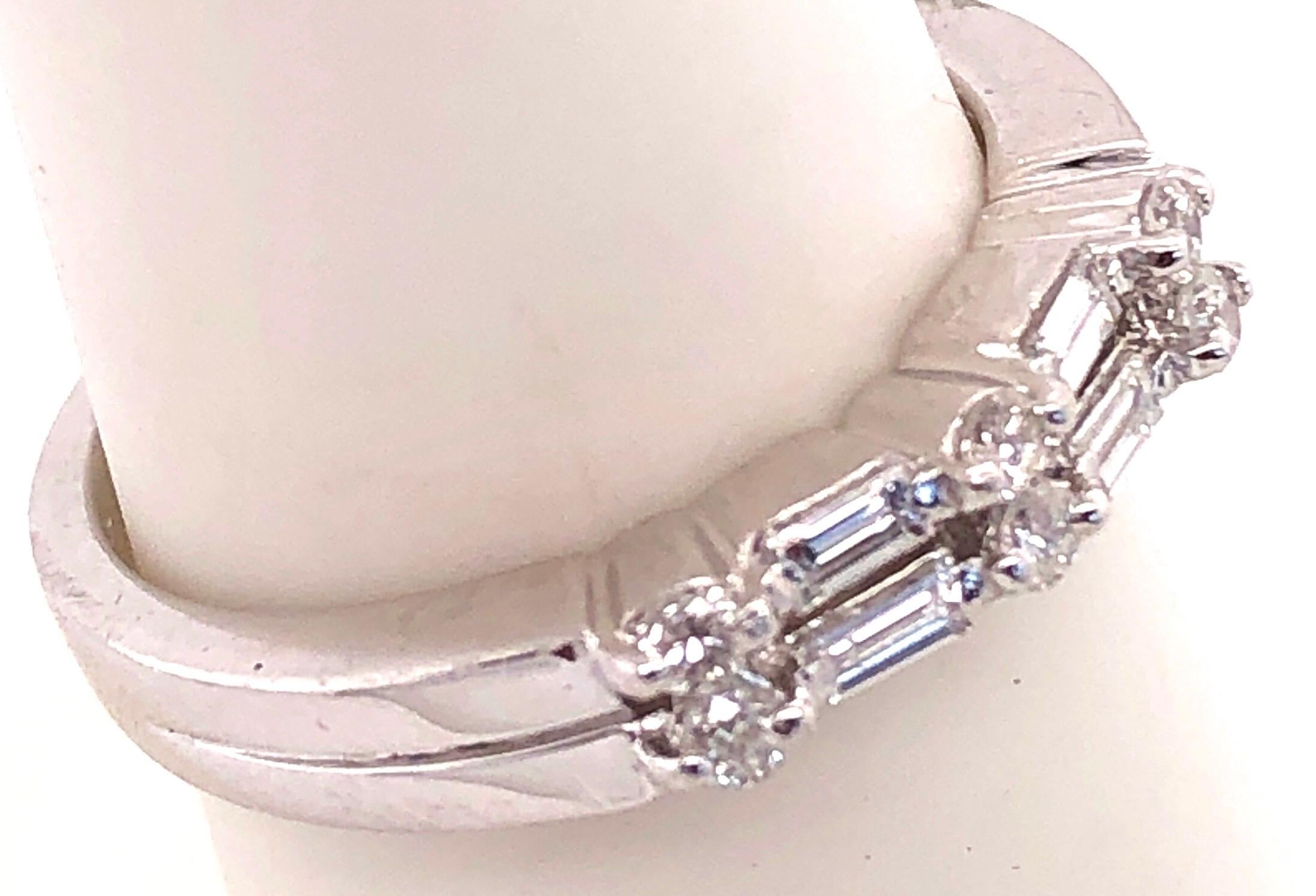 14 Karat White Gold Diamond Wedding Bridal Anniversary Band Ring 
0.50 Total Diamond Weight.
Size 6.75 
5.12 grams total weight 