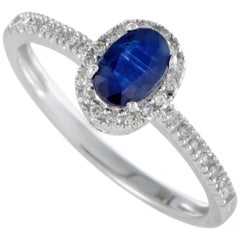 14 Karat White Gold Diamonds and Sapphire Oval Ring