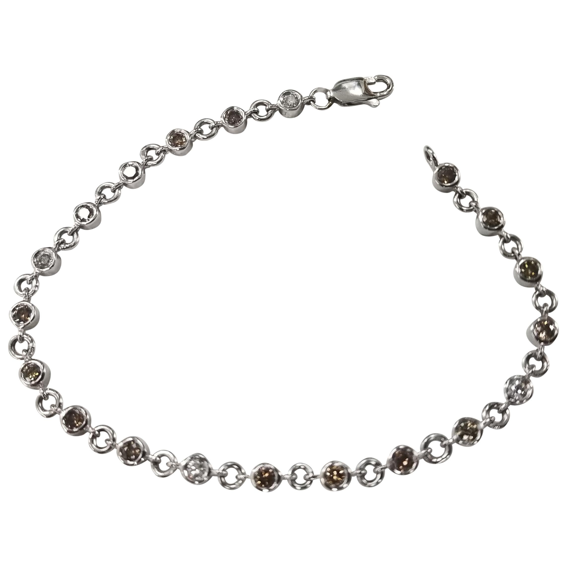Tennisarmband aus 14 Karat Weißgold mit Diamanten und Lünette