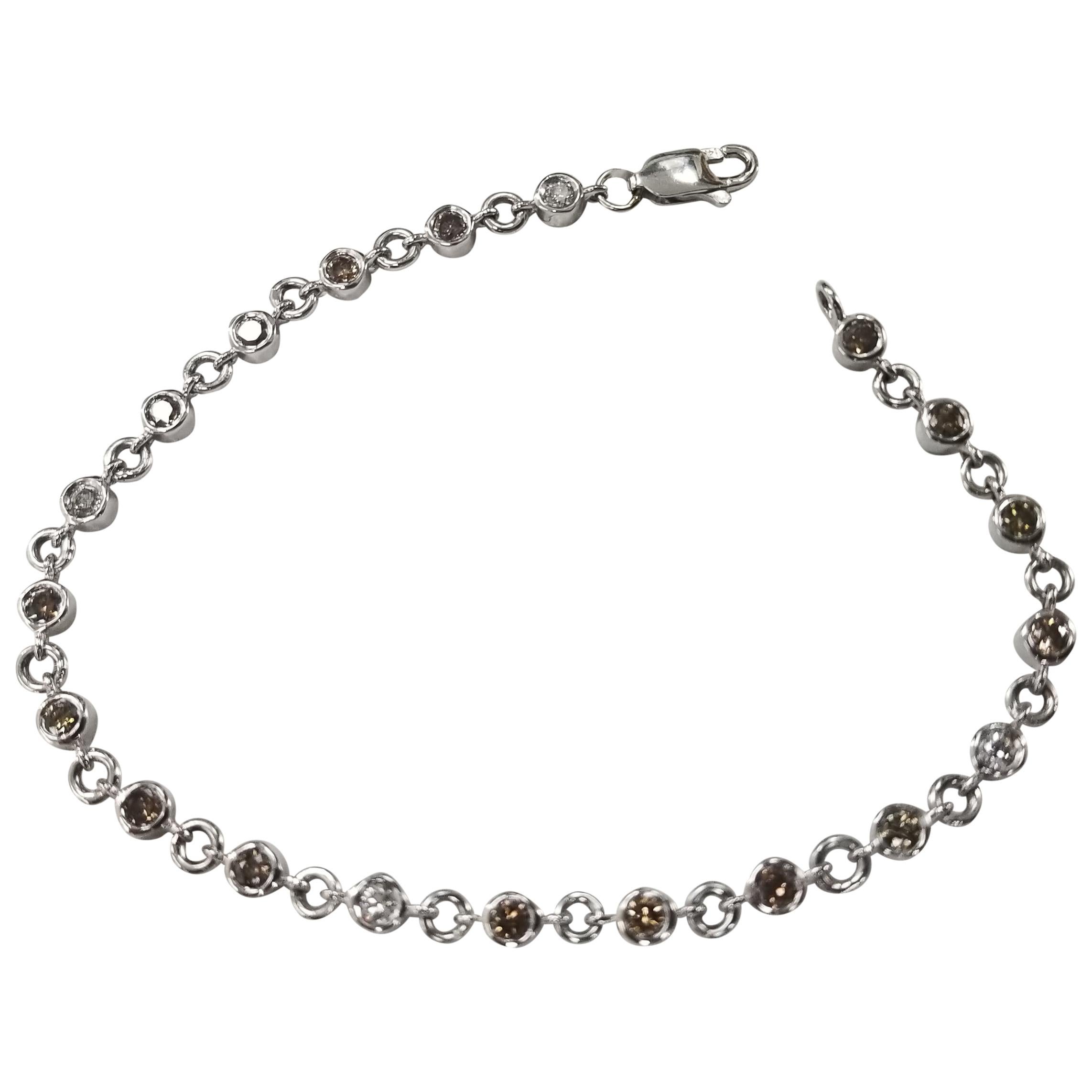 Bracelet tennis en or blanc 14 carats avec diamants et lunette