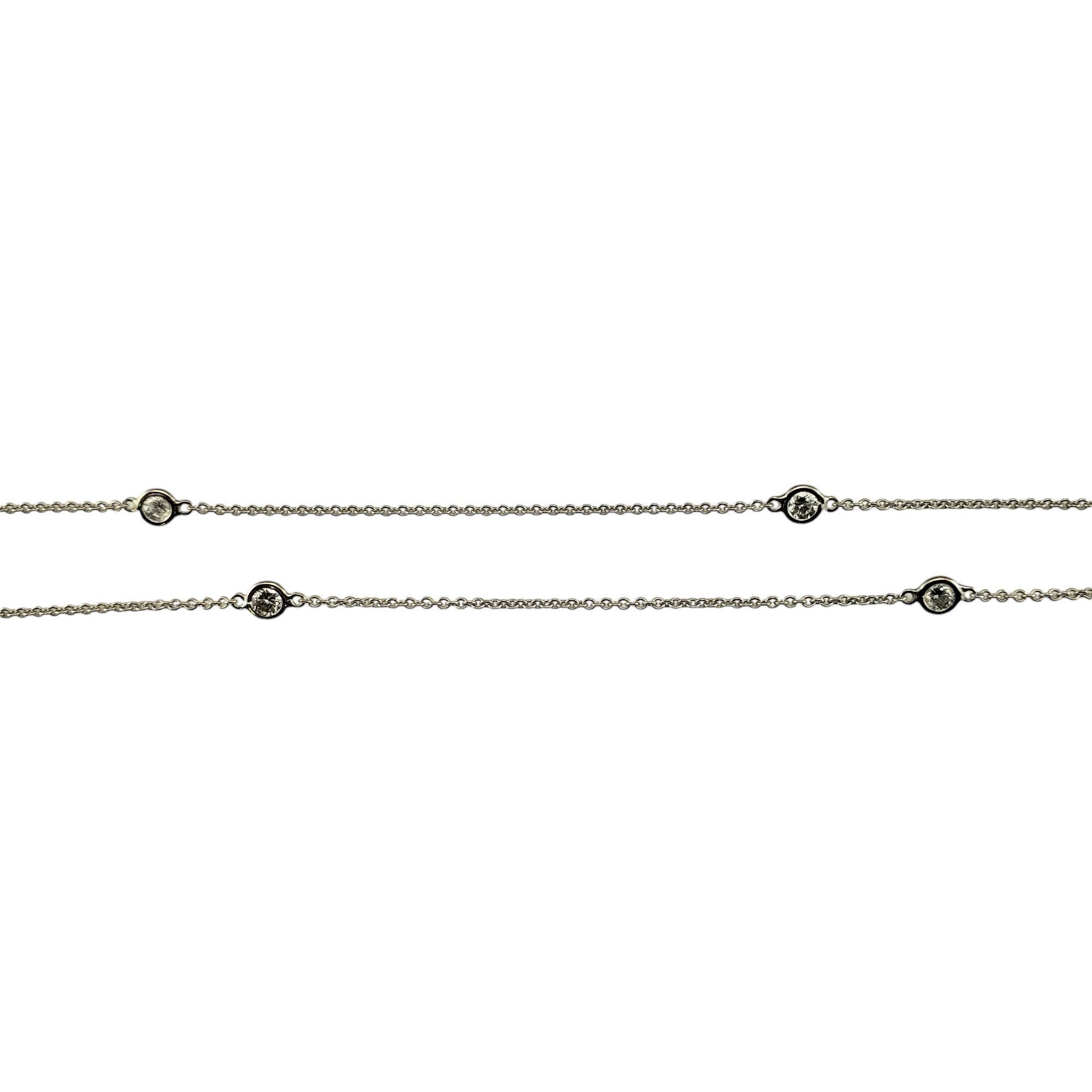 14 Karat White Gold Diamonds By The Yard Necklace

This sparkling station necklace features seven round brilliant cut diamonds set in classic 14K white gold.

Approximate total diamond weight: .40 ct. - .49 ct.

Diamond color: H

Diamond