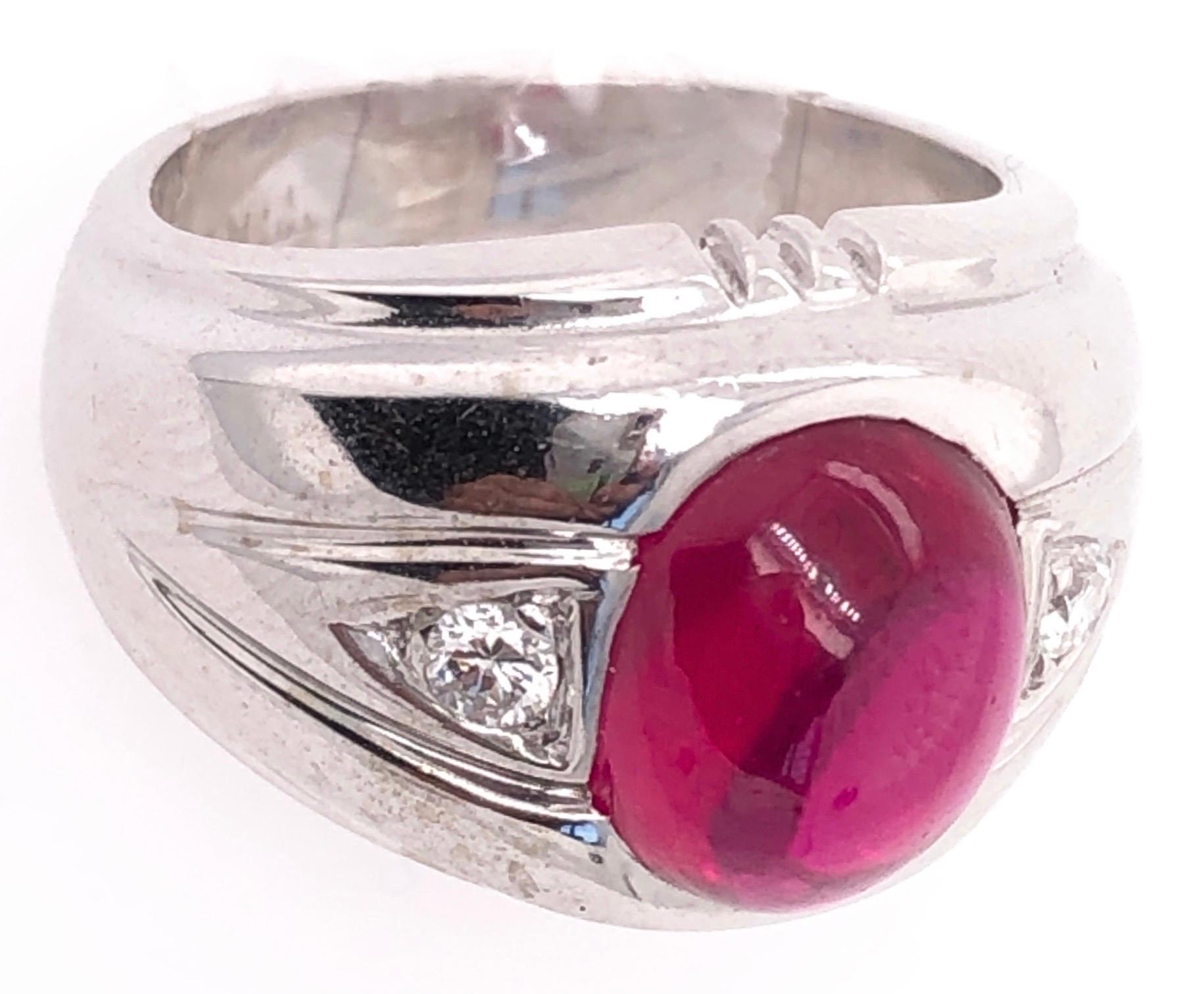 Contemporary 14 Karat White Gold Dome Ring with Garnet Cabochon and Diamond Accents For Sale
