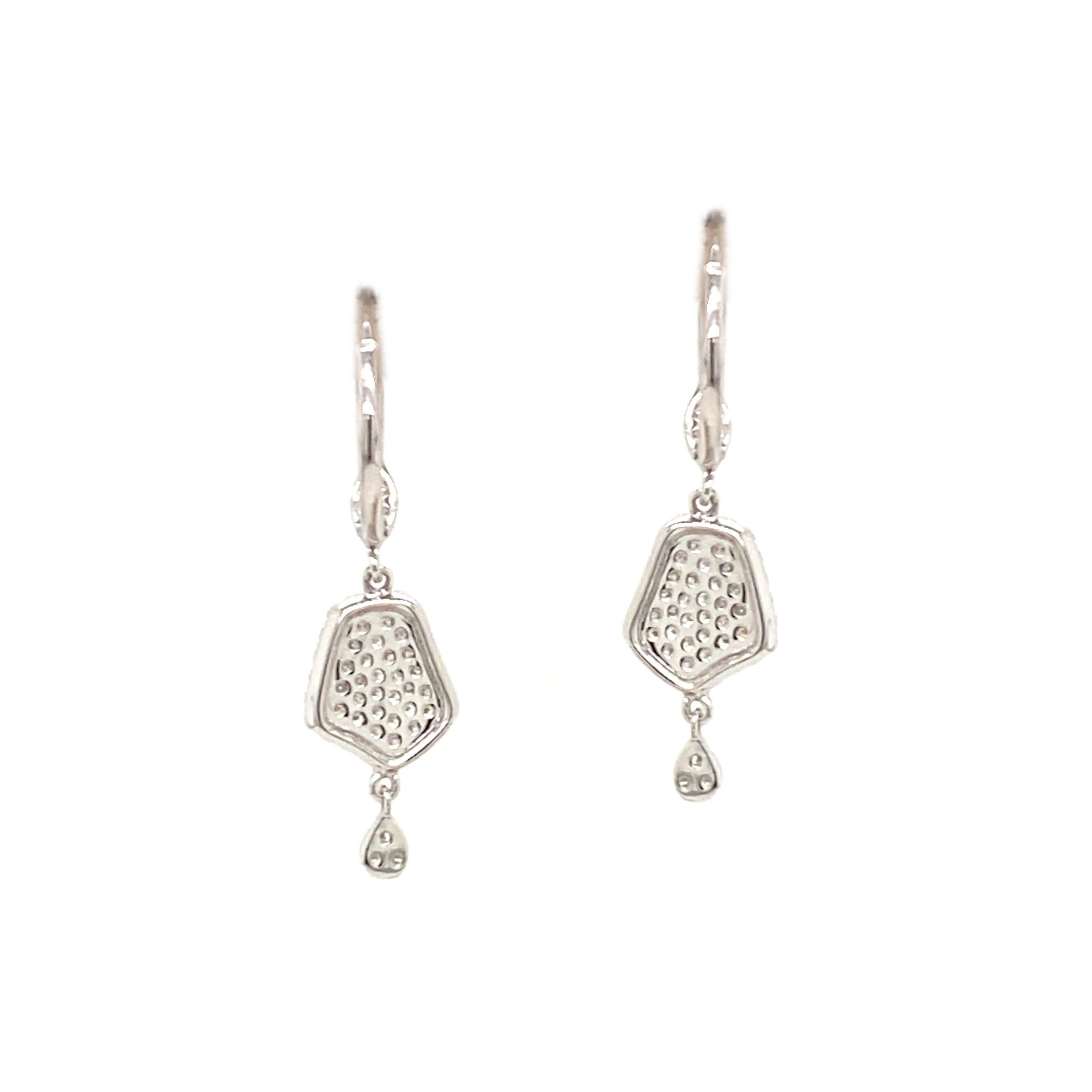 Feminine pave drop earrings with fluid movement with2 different drops.
14 Karat white gold
172 Round diamonds .45 Carat Total Weight  G-H/ SI1
Leverback
14