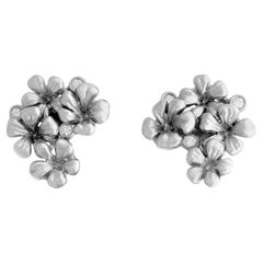 White Gold Earrings by the Artist with Diamonds Featured in Berlinale