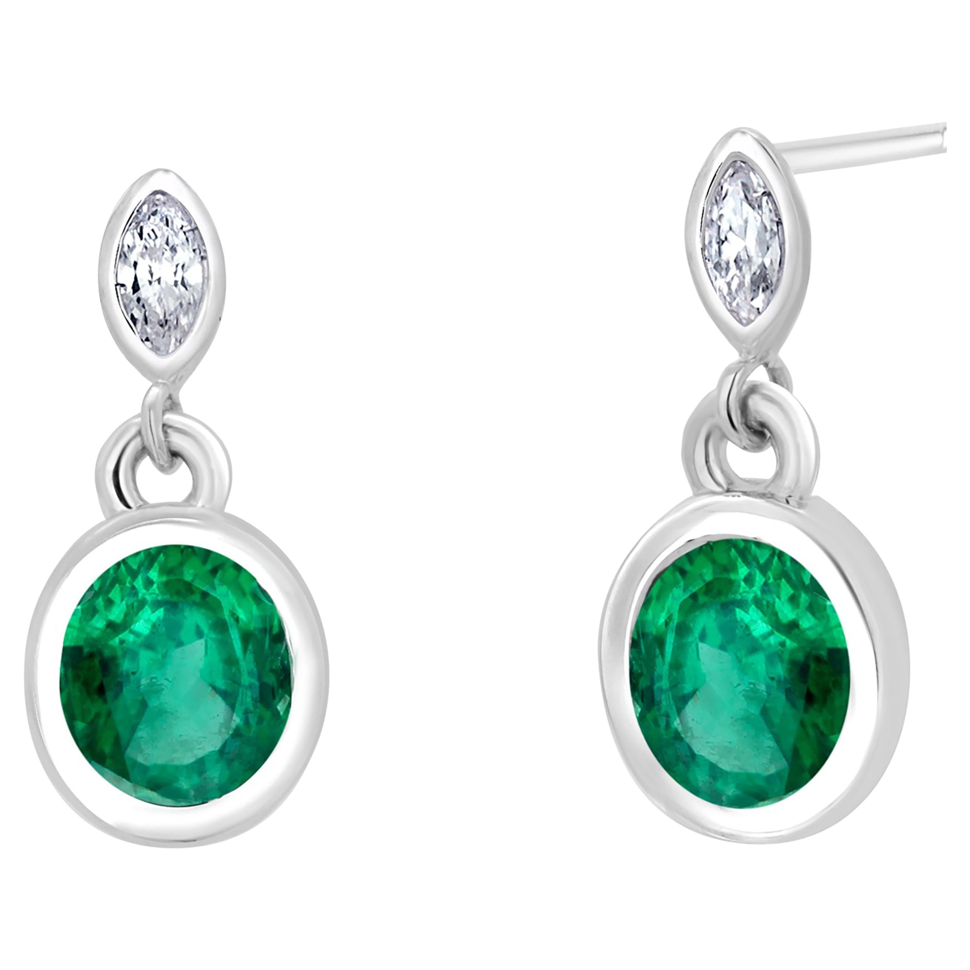 14 Karat White Gold Earrings with Oval Emerald Drops and Marquise Diamond