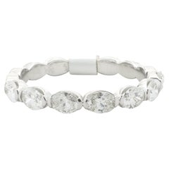 14 Karat White Gold East-West Oval Cut Diamond Band