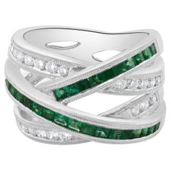 14 Karat White Gold Emerald and Diamond Double Bypass Ring