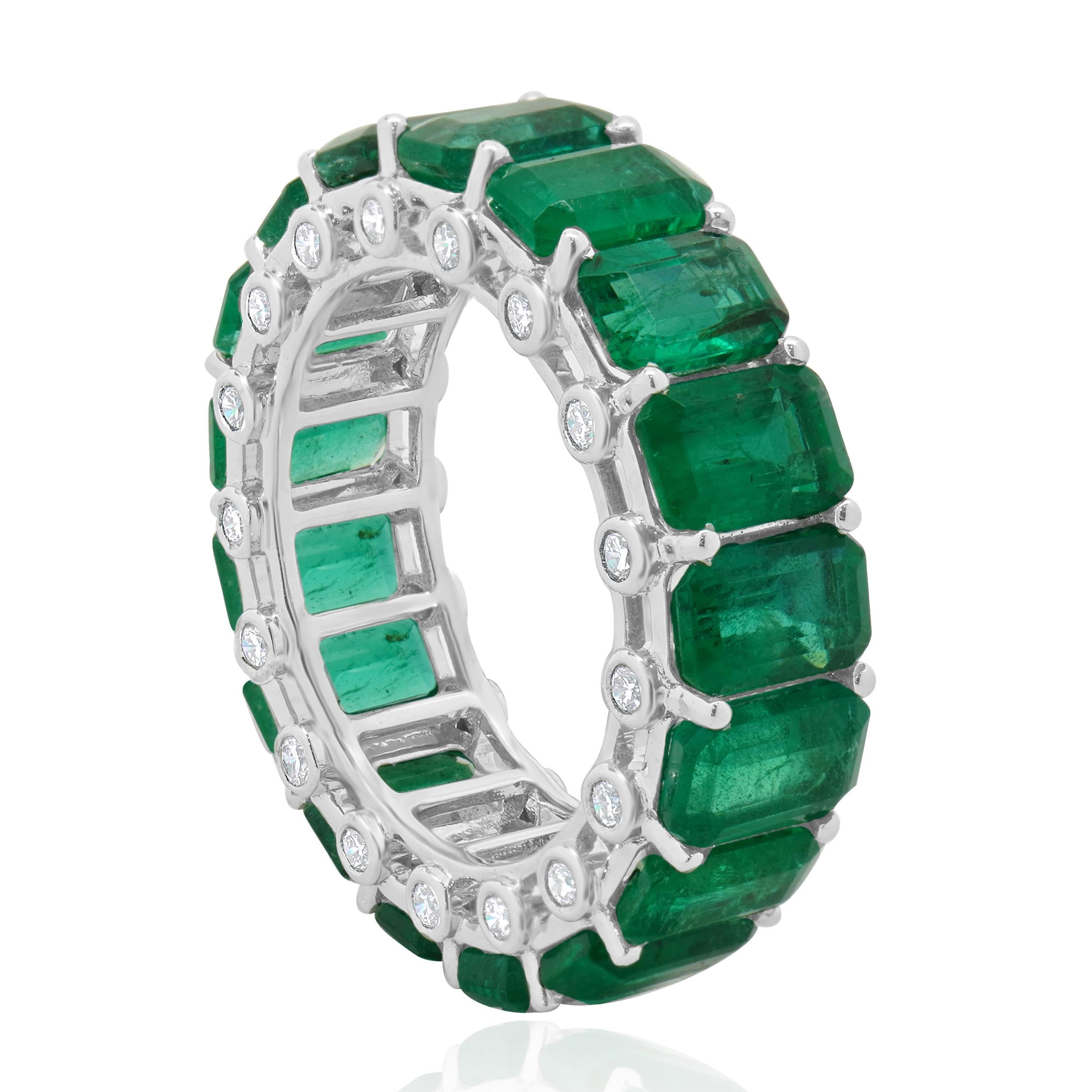 Designer: custom
Material: 14K white gold
Diamond:  34 round brilliant cut = 0.51cttw
Color: G	
Clarity: VS-SI1
Emerald: 17 emerald cut = 9.72cttw
Ring size: 6 (please allow two additional shipping days for sizing requests)
Weight: 5.53 grams
