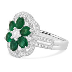14 Karat White Gold Emerald and Diamond Flower Ring