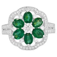 14 Karat White Gold Emerald and Diamond Flower Ring