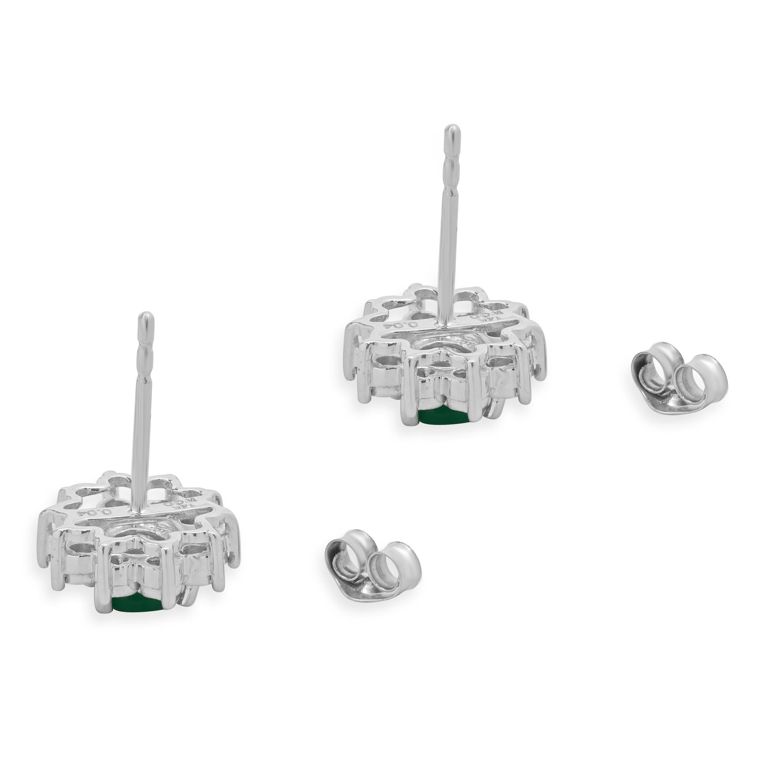 14 Karat White Gold Emerald and Diamond Halo Stud Earrings In Excellent Condition For Sale In Scottsdale, AZ