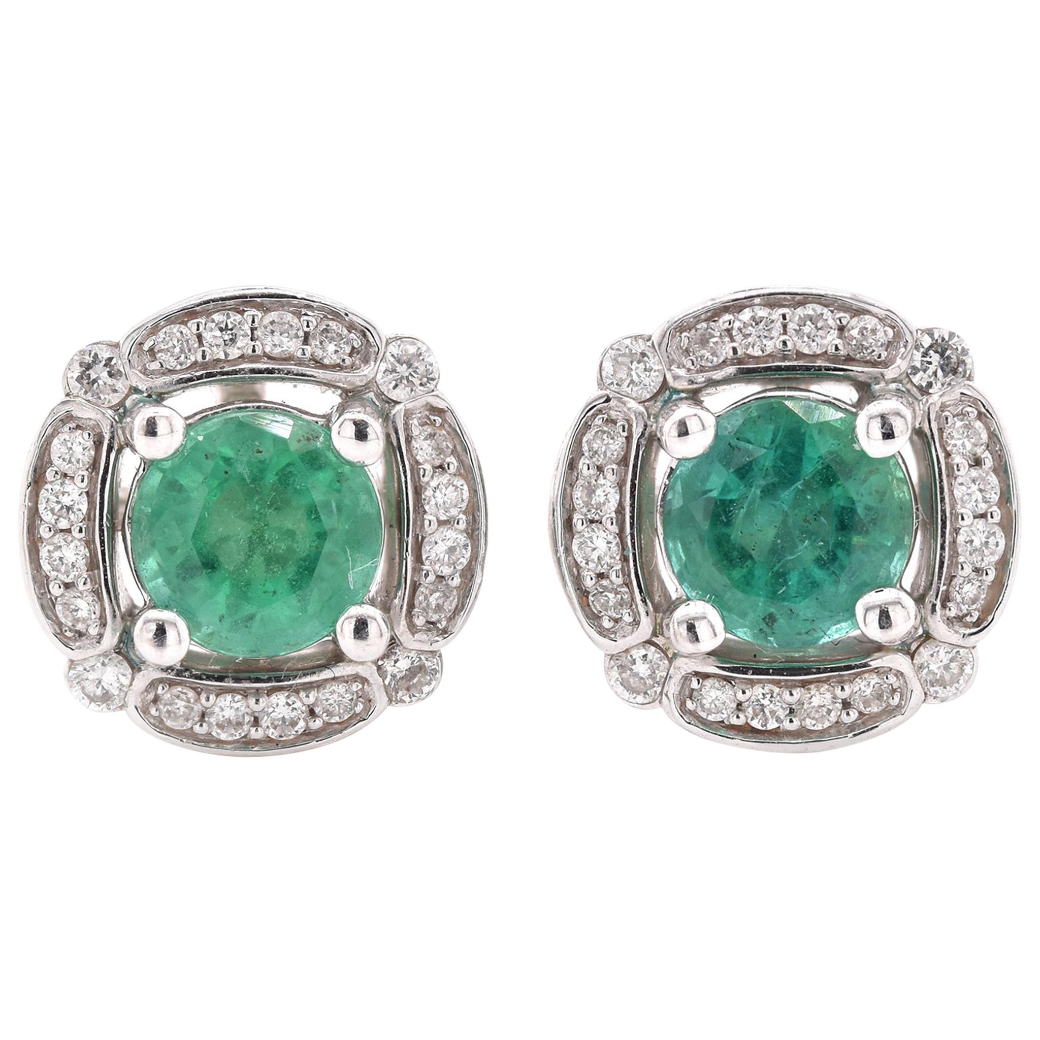 Emerald Cut Emerald and Diamond Halo Stud Earrings at 1stDibs emerald cut emerald earrings
