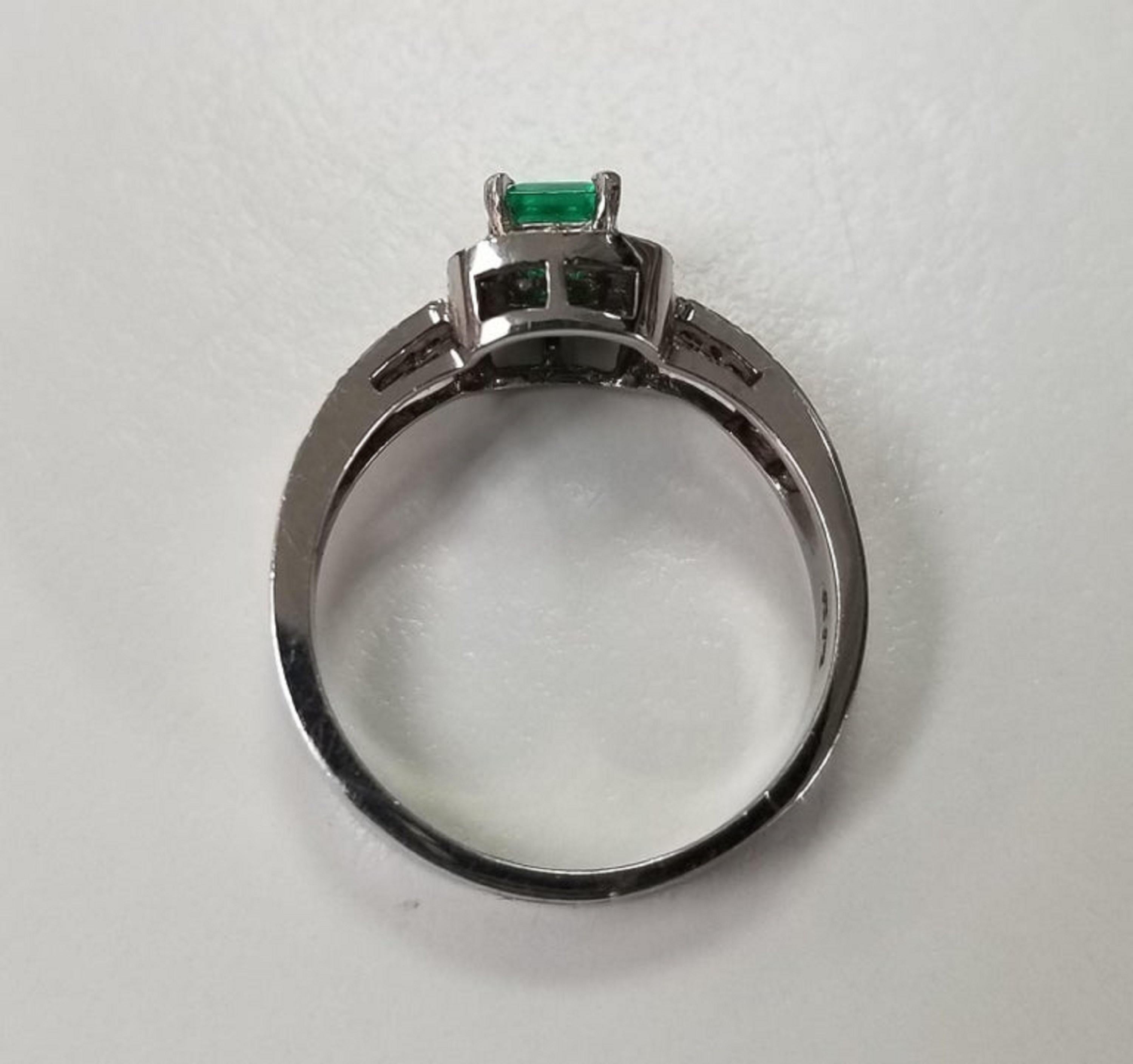 Emerald Cut 14 Karat White Gold Emerald and Diamond Ring For Sale