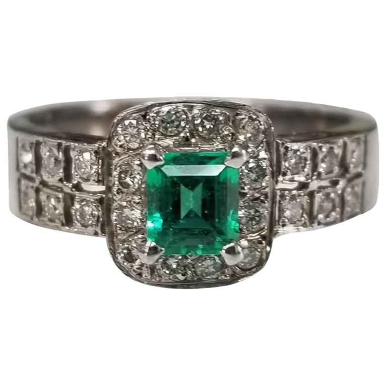 14 Karat White Gold Emerald and Diamond Ring For Sale