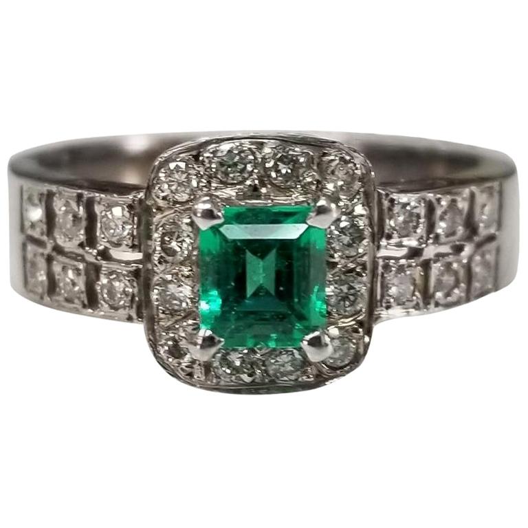 14 Karat White Gold Emerald and Diamond Ring For Sale