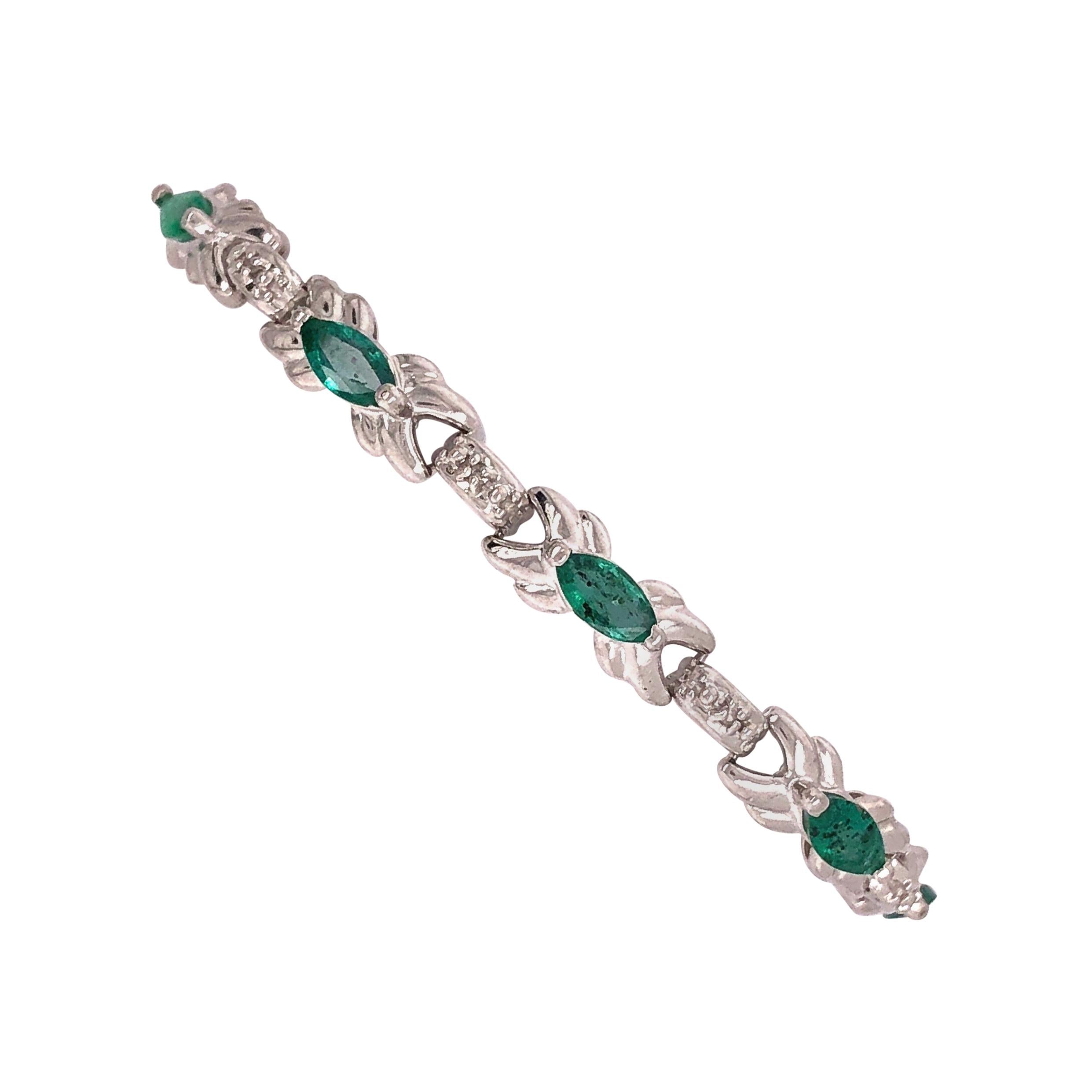 14 Karat White Gold Emerald Bracelet with Round Diamonds