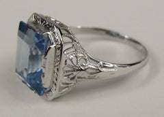 14 Karat White Gold Emerald Cut Blue Topaz Ring Art Deco