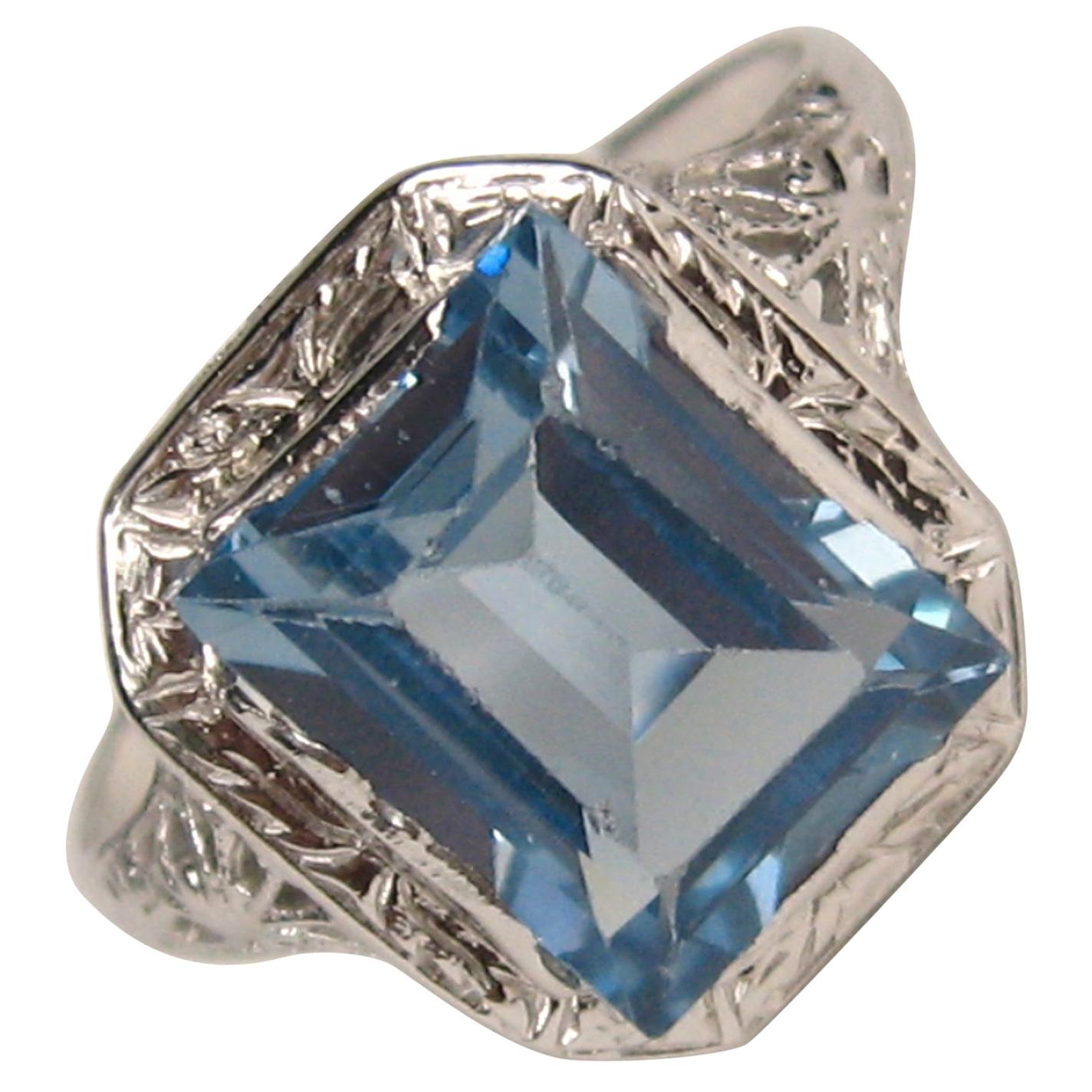 14 Karat White Gold Emerald Cut Blue Topaz Ring Art Deco For Sale