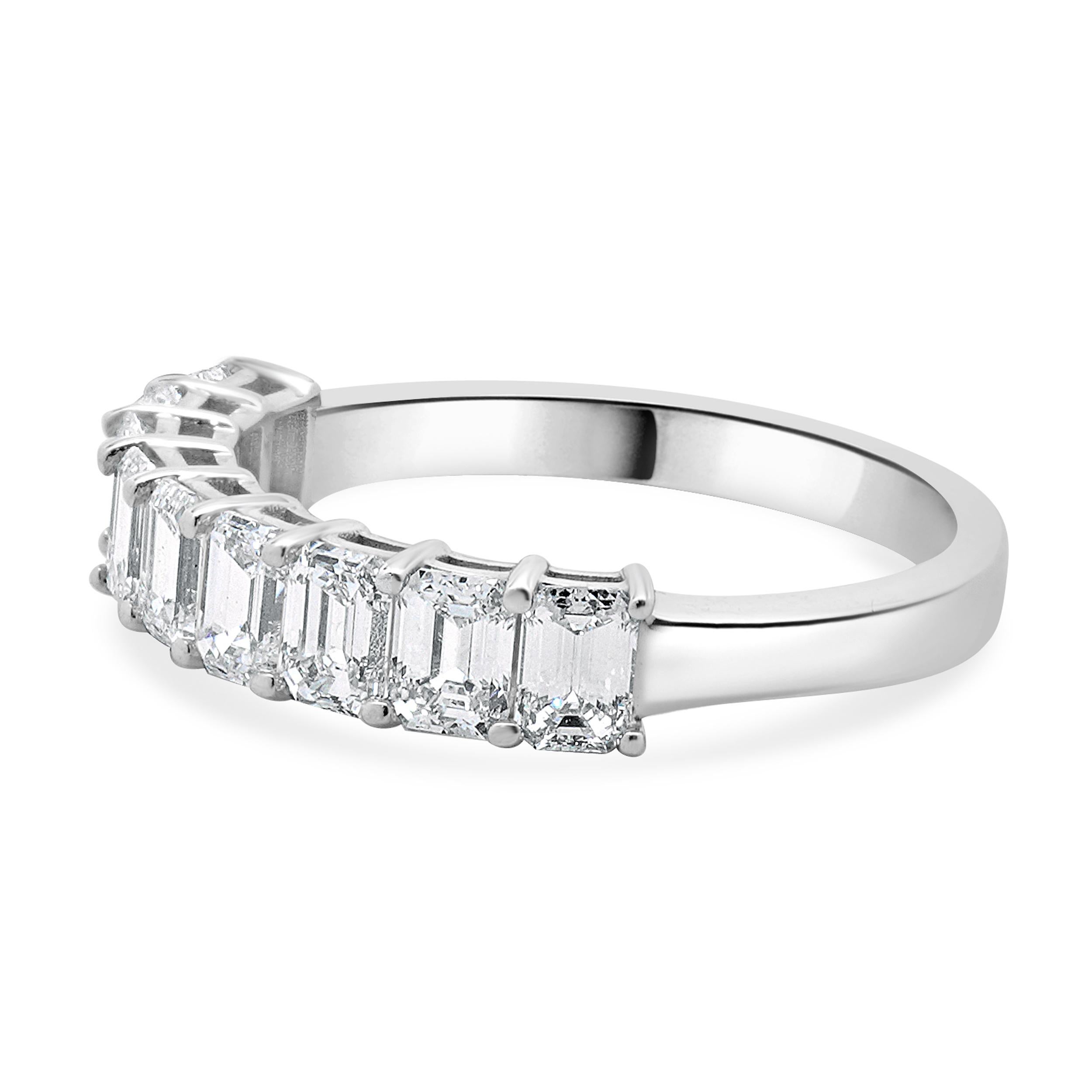 Designer: custom
Material: 14K white gold
Diamond: 9 emerald cut = 1.70cttw
Color: G / H
Clarity: VS-SI1
Ring size: 6.75 (please allow two additional shipping days for sizing requests)
Weight: 2.85 grams
