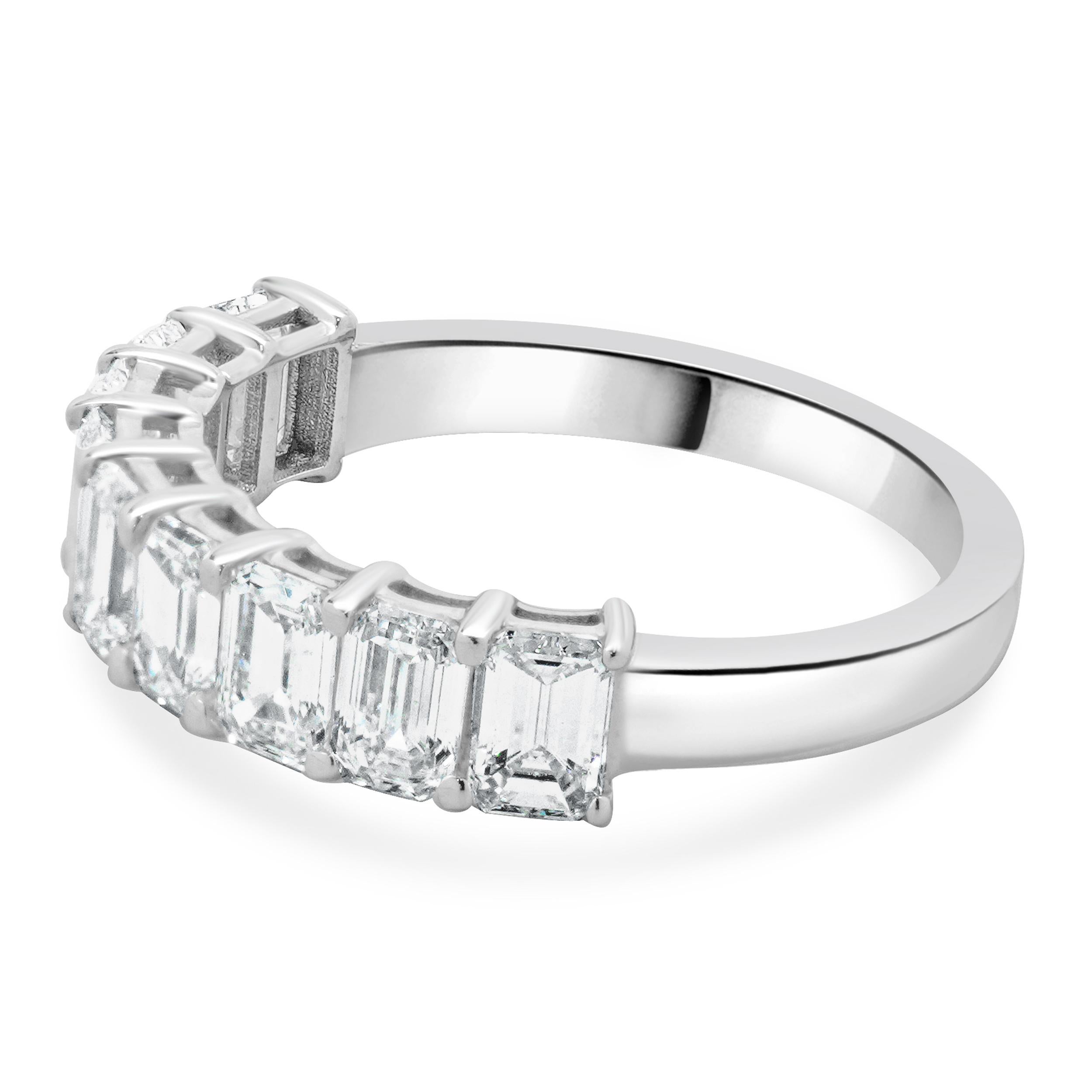 Designer: custom
Material: 14K white gold
Diamond: 9 emerald cut = 2.25cttw
Color: G
Clarity: VS-SI1
Ring size: 6.5 (please allow two additional shipping days for sizing requests)
Weight: 3.08 grams
