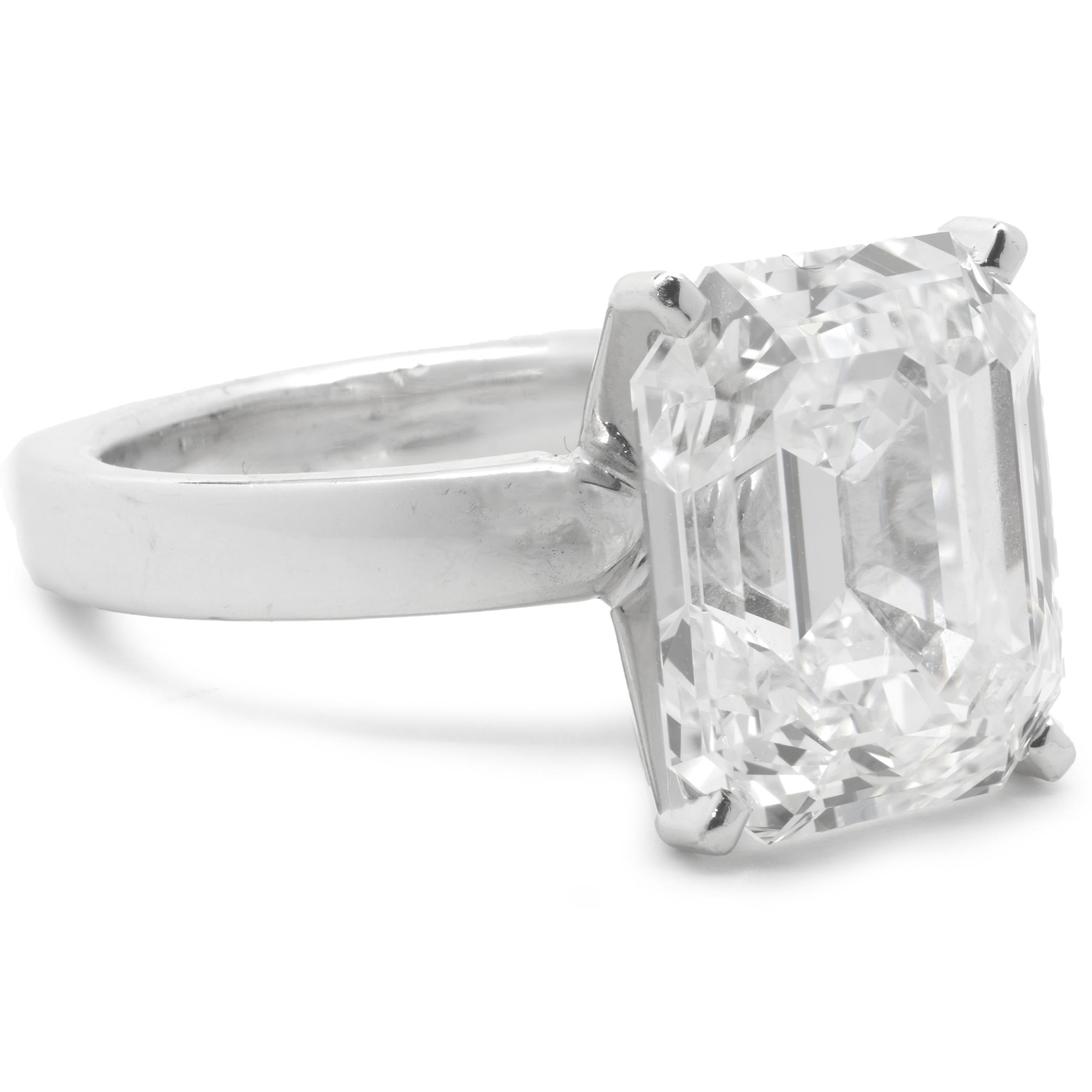 Designer: custom
Material: 14K white gold
Diamond: 1 emerald cut = 8.58ct
Color: G
Clarity: VVS2
GIA: 1186756037
Ring Size: 6 (please allow up to 2 additional business days for sizing requests)
Dimensions: ring top measures 12.78mm wide
Weight: 7.02