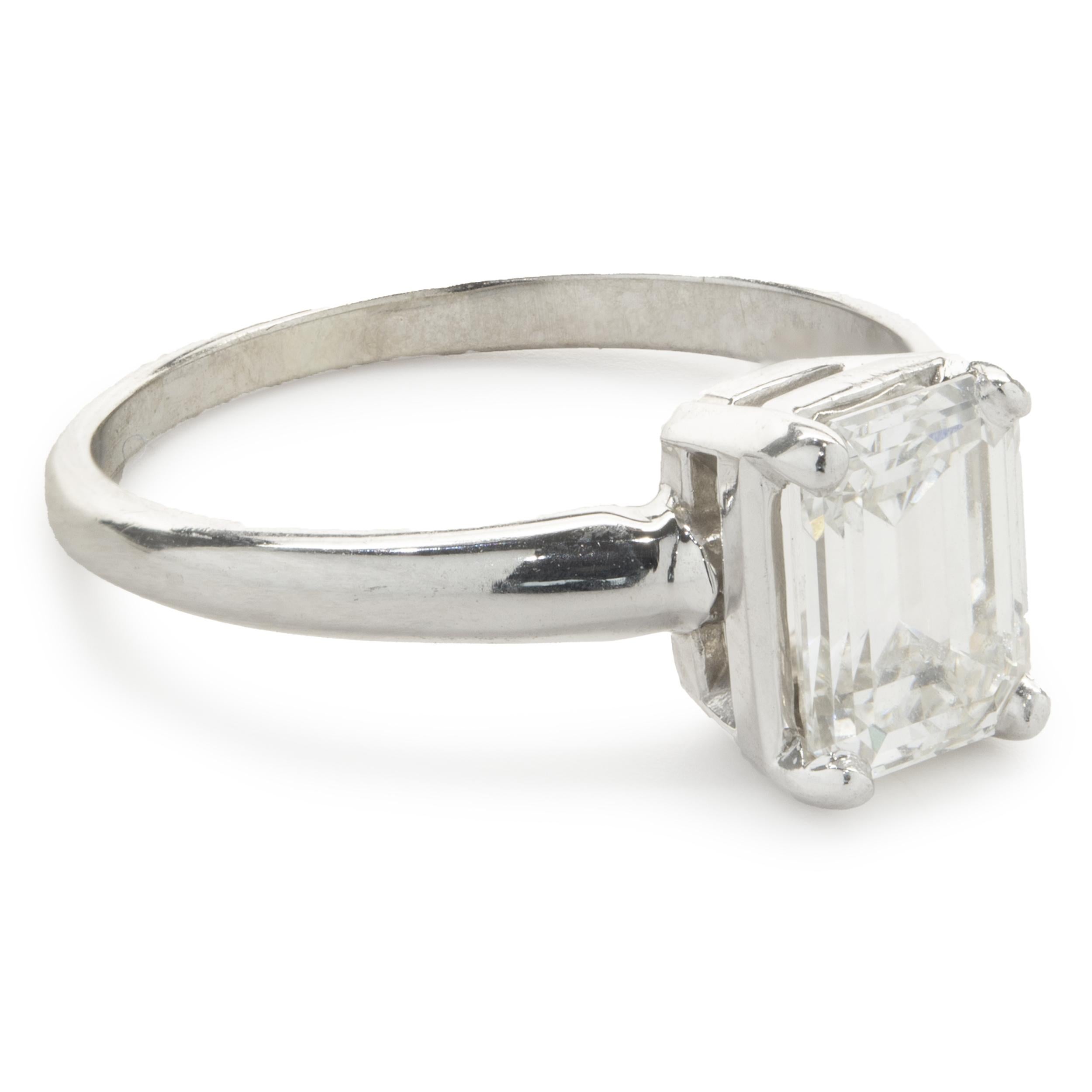 Designer: custom
Material: 14K white gold
Center Diamond: 1 emerald cut = 1.30ct
Color: I
Clarity: VVS2
GIA: 7233132095
Ring Size: 6 (please allow two additional shipping days for sizing requests)
Dimensions: ring top measures 7.89mm wide
Weight: