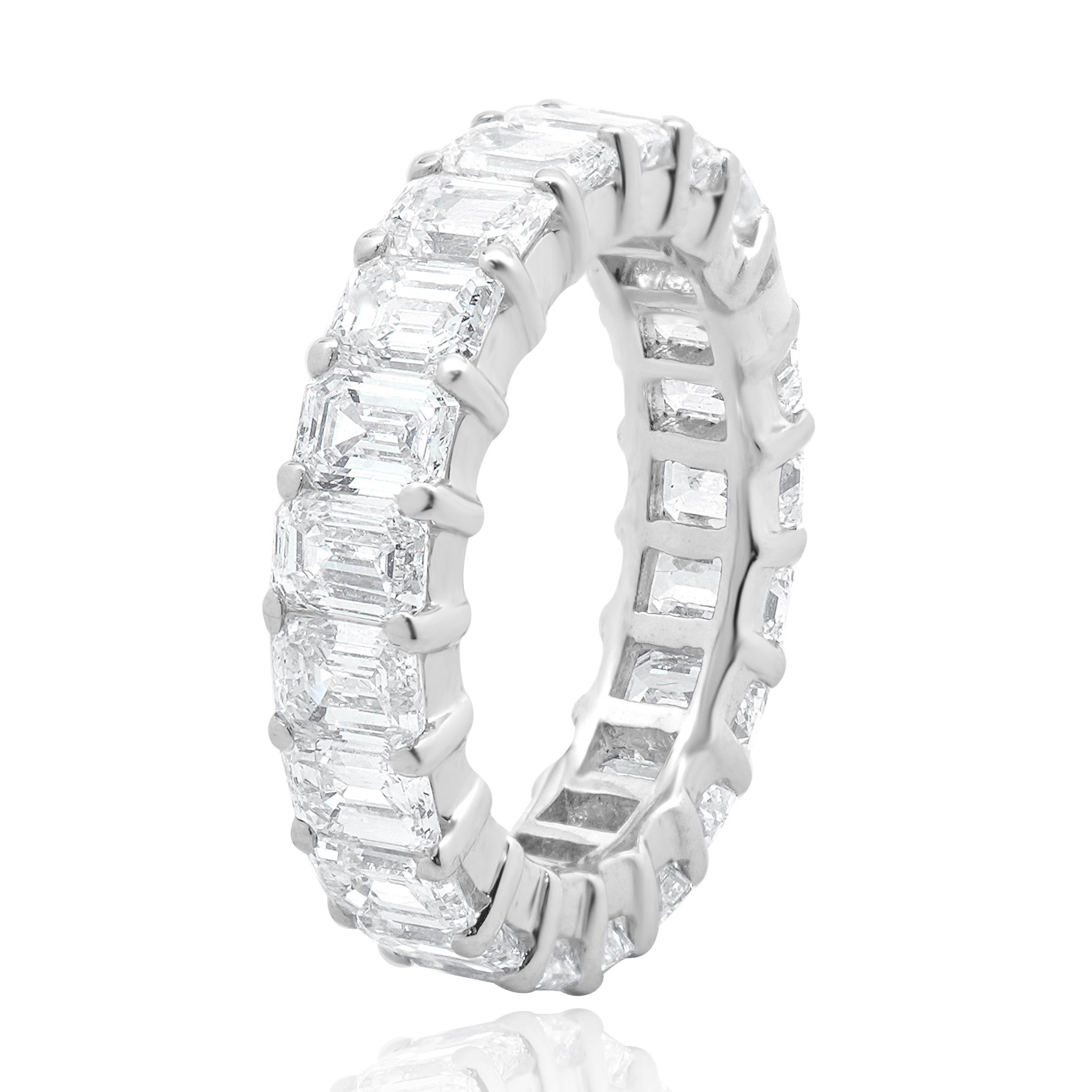 Designer: custom
Material: 14K white gold
Diamond: 21 emerald cut = 5.89cttw
Color: G / H
Clarity: VS-SI1
Ring size: 5.5 (please allow two additional shipping days for sizing requests)
Weight: 4.37 grams
