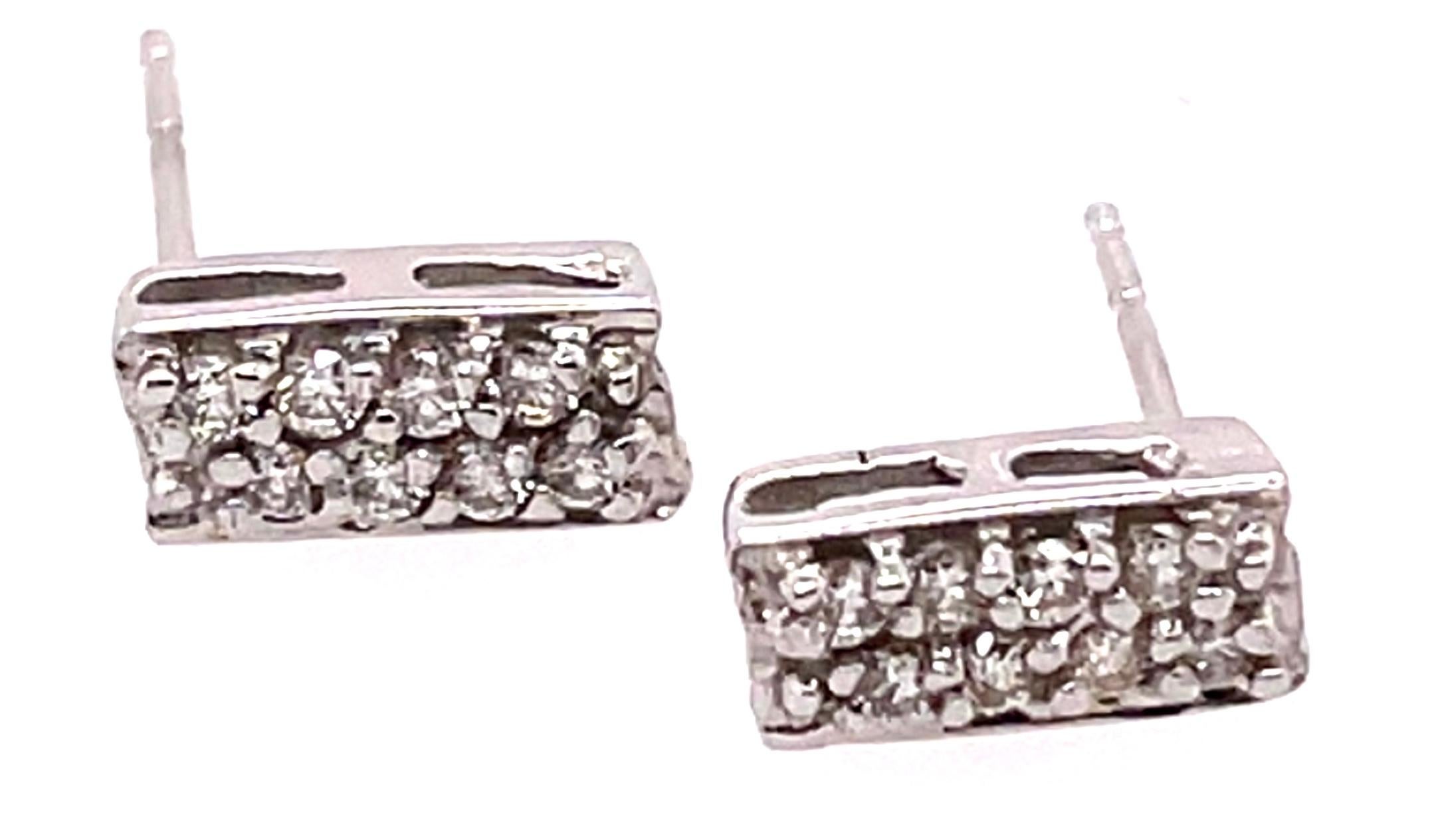 14 Karat White Gold Fancy Earrings with Round Diamonds.
22 pcs of diamonds with 1.20 total diamond weight 
2 grams total weight.
