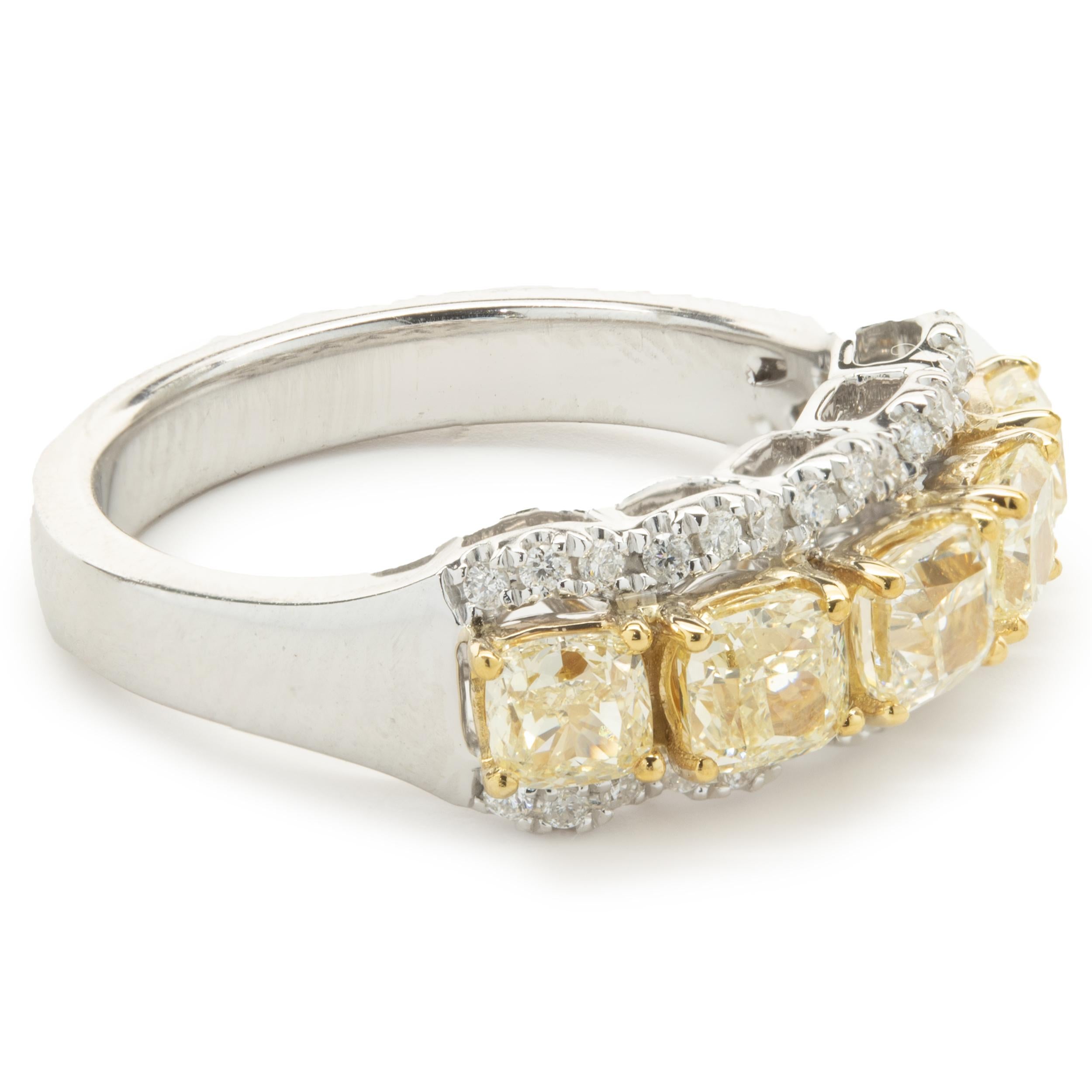 Designer: custom
Material: 14K white gold
Diamond: 5 cushion cut = 1.80cttw
Color: Fancy Yellow
Clarity: SI1
Diamond: 30 round brilliant cut = .30cttw
Color: G
Clarity: SI1
Ring size: 6 (please allow two additional shipping days for sizing