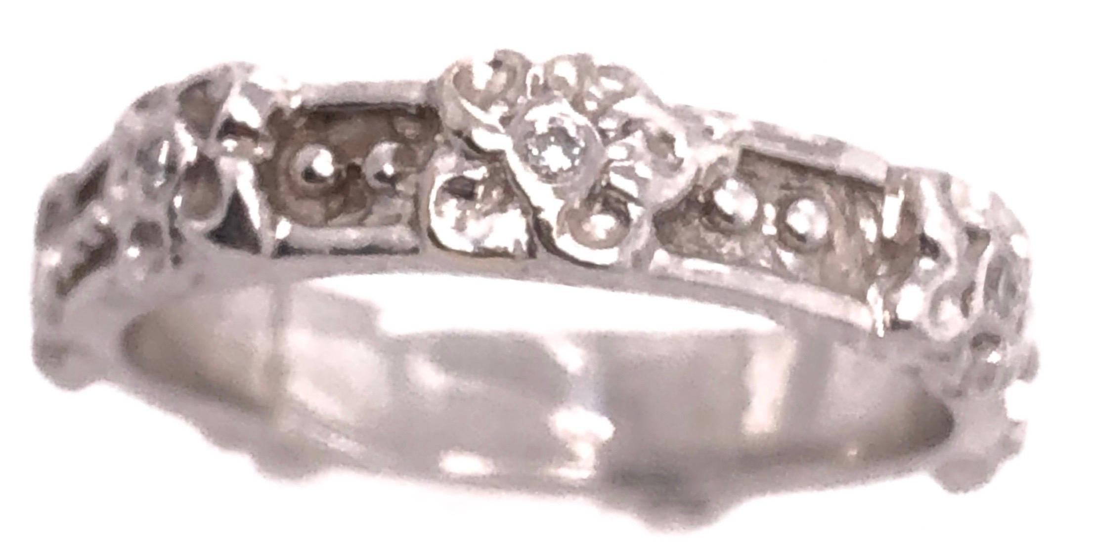 14 Karat White Gold Fashion Ring with Diamonds 0.25 TDW.
Size 7
3 grams total weight