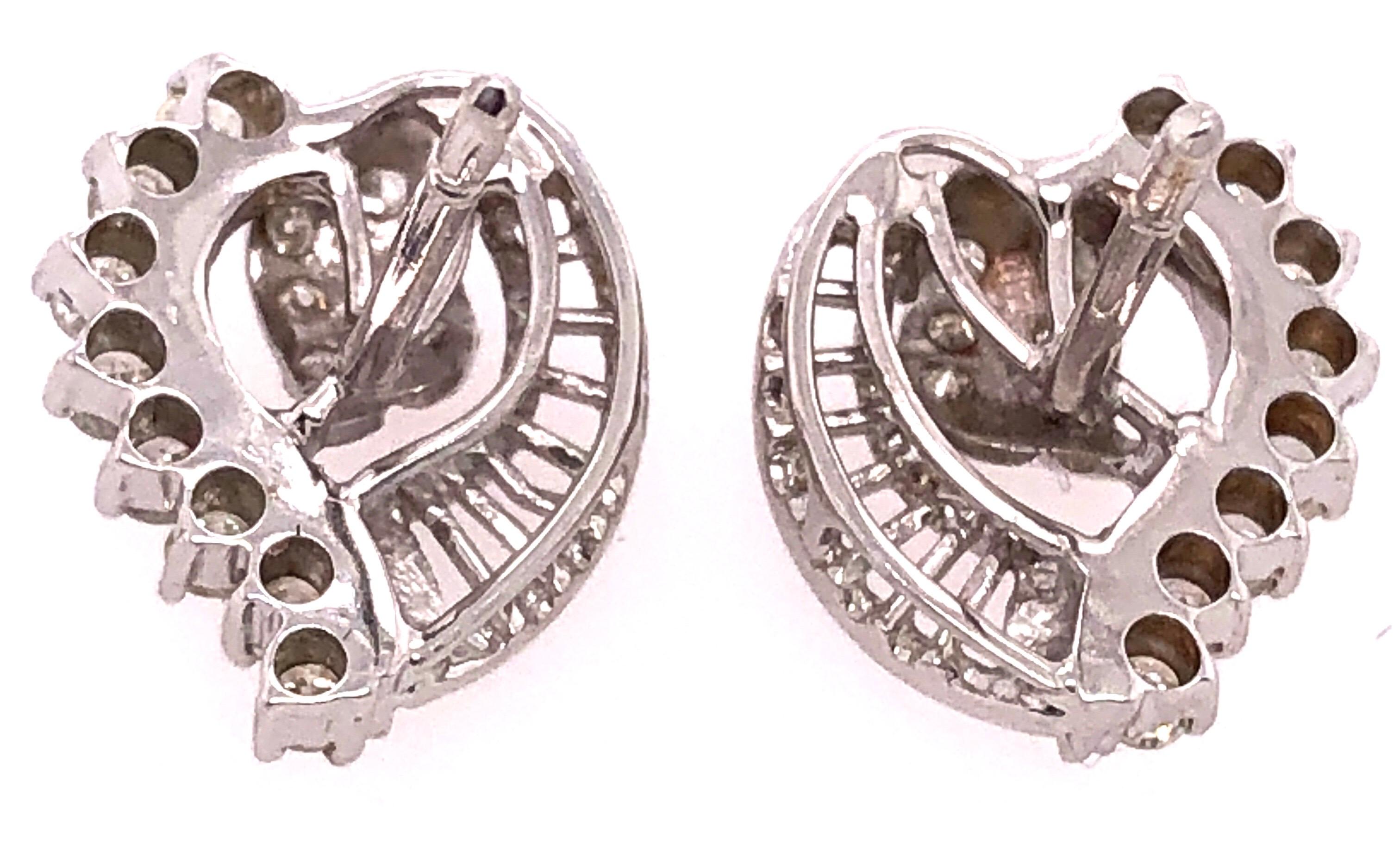 14 Karat White Gold Fashion Earrings with Diamonds 1.25 TDW.
4.98 grams total weight.