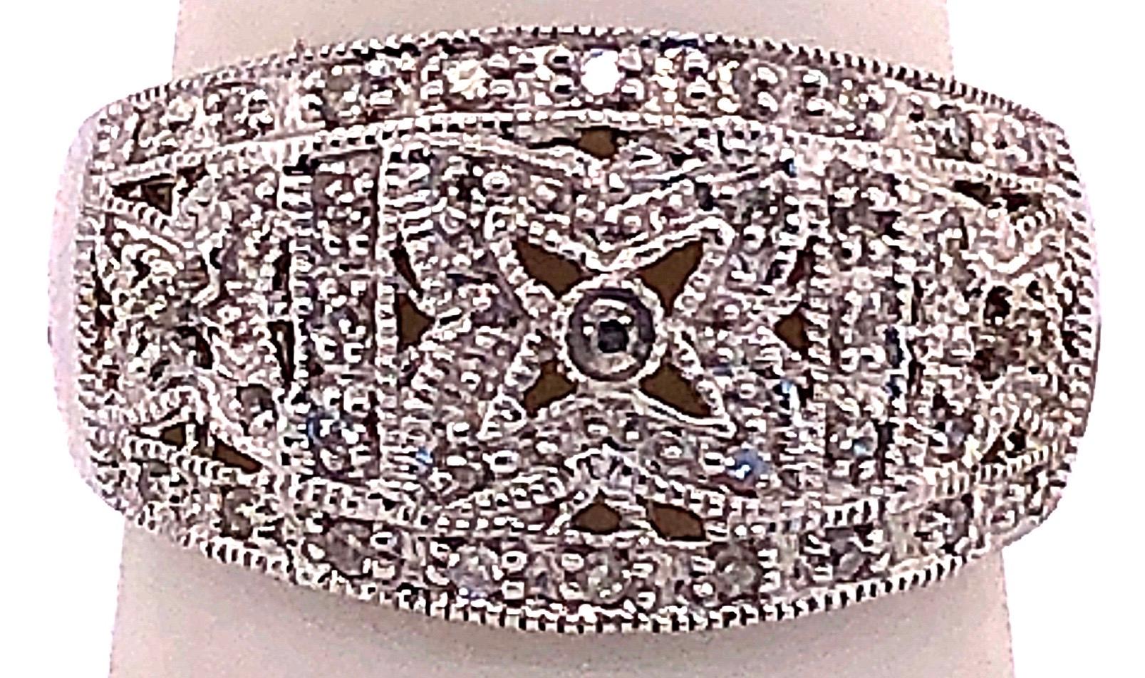 14 Karat White Gold Fashion Ring with Round Diamonds Size 7.
0.35 total diamond weight.
5 grams total weight.
11.58 ring height.