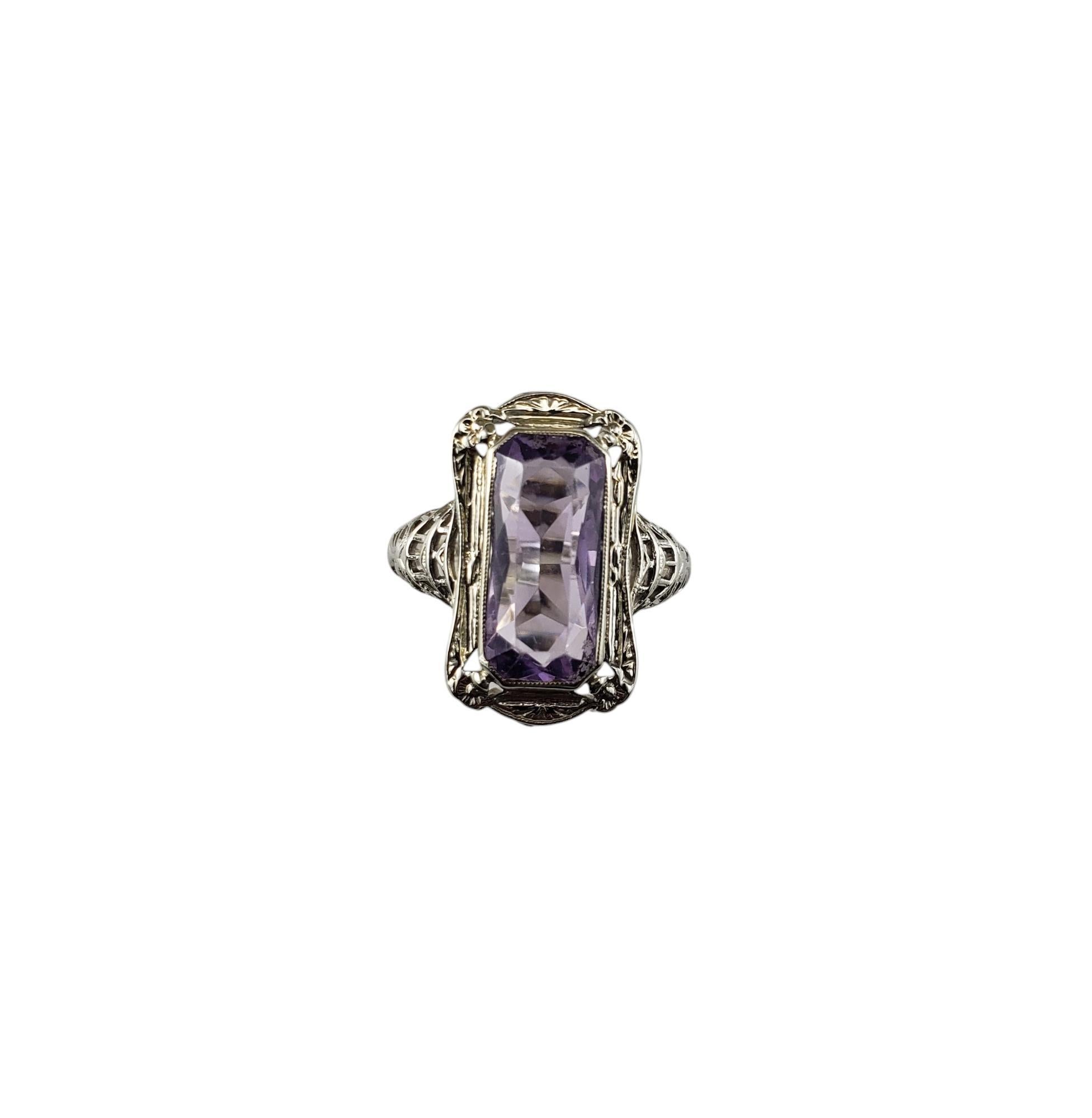 14 Karat White Gold Filigree and Amethyst Ring Size 7.25

This elegant ring feature one rectangular amethyst (15 mm x 7 mm) set in beautifully detailed 14K white gold filigree. 

Top of ring measures 20 mm x 12 mm. Shank: 1.5 mm.

Ring Size: