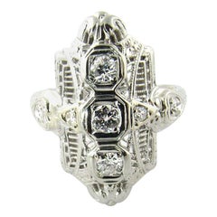 Bague filigrane en or blanc 14 carats