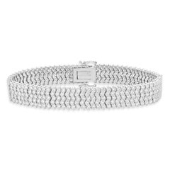 Pulsera ondulada de cinco filas de diamantes en oro blanco de 14 quilates