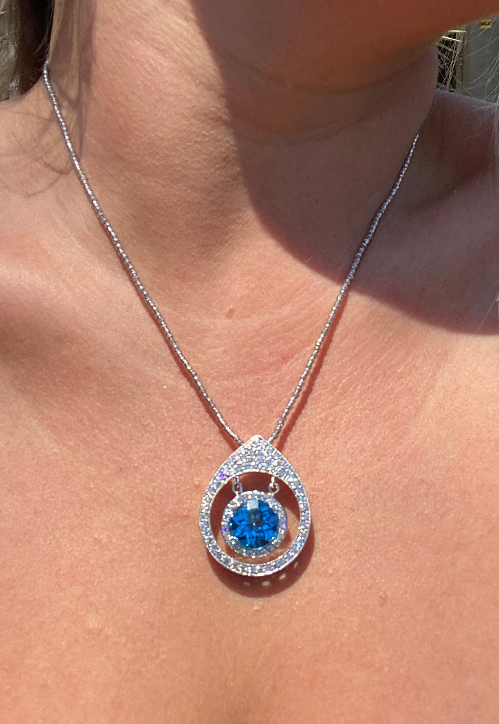 Women's 14 Karat White Gold Floating Blue Topaz and Diamond Necklace