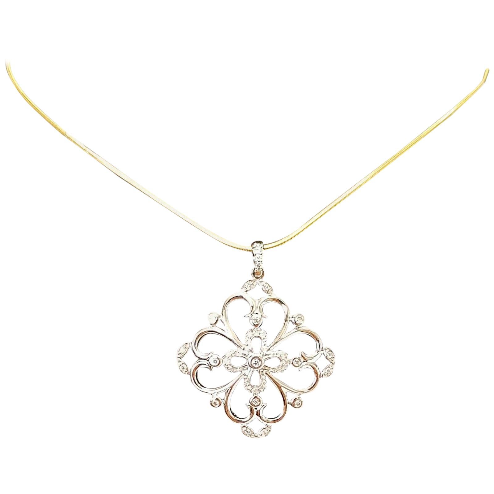 14 Karat White Gold Floral Design Pendant with Diamonds with .50 Points