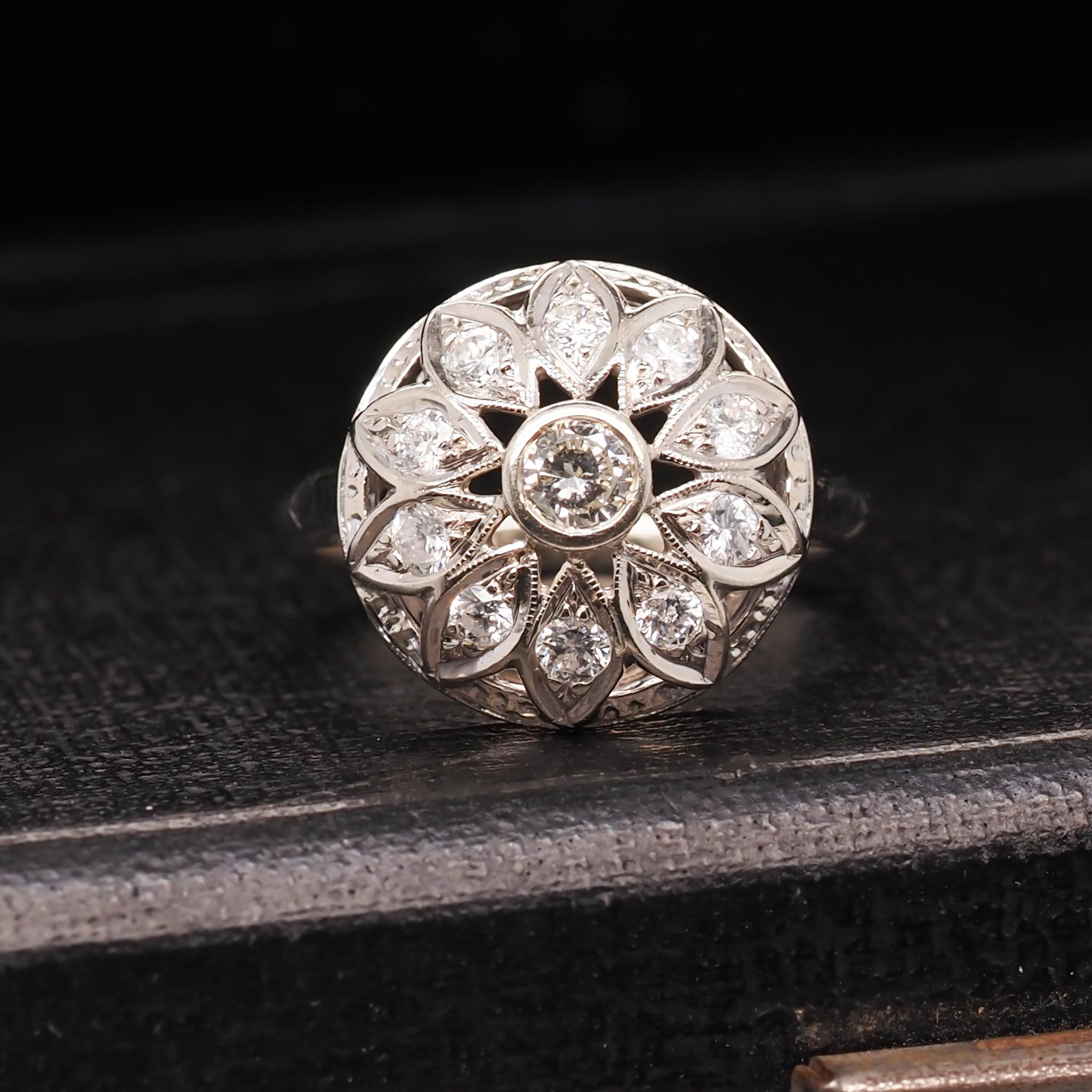 Year: 1950s

Item Details:
Ring Size: 8.25
Metal Type: 14K White Gold [Hallmarked, and Tested]
Weight: 4.0grams

Diamond Details: .50ct, total weight, G Color VS Clarity, Transitional Round Brilliant.

Band Width: 2.03mm
Condition: Excellent