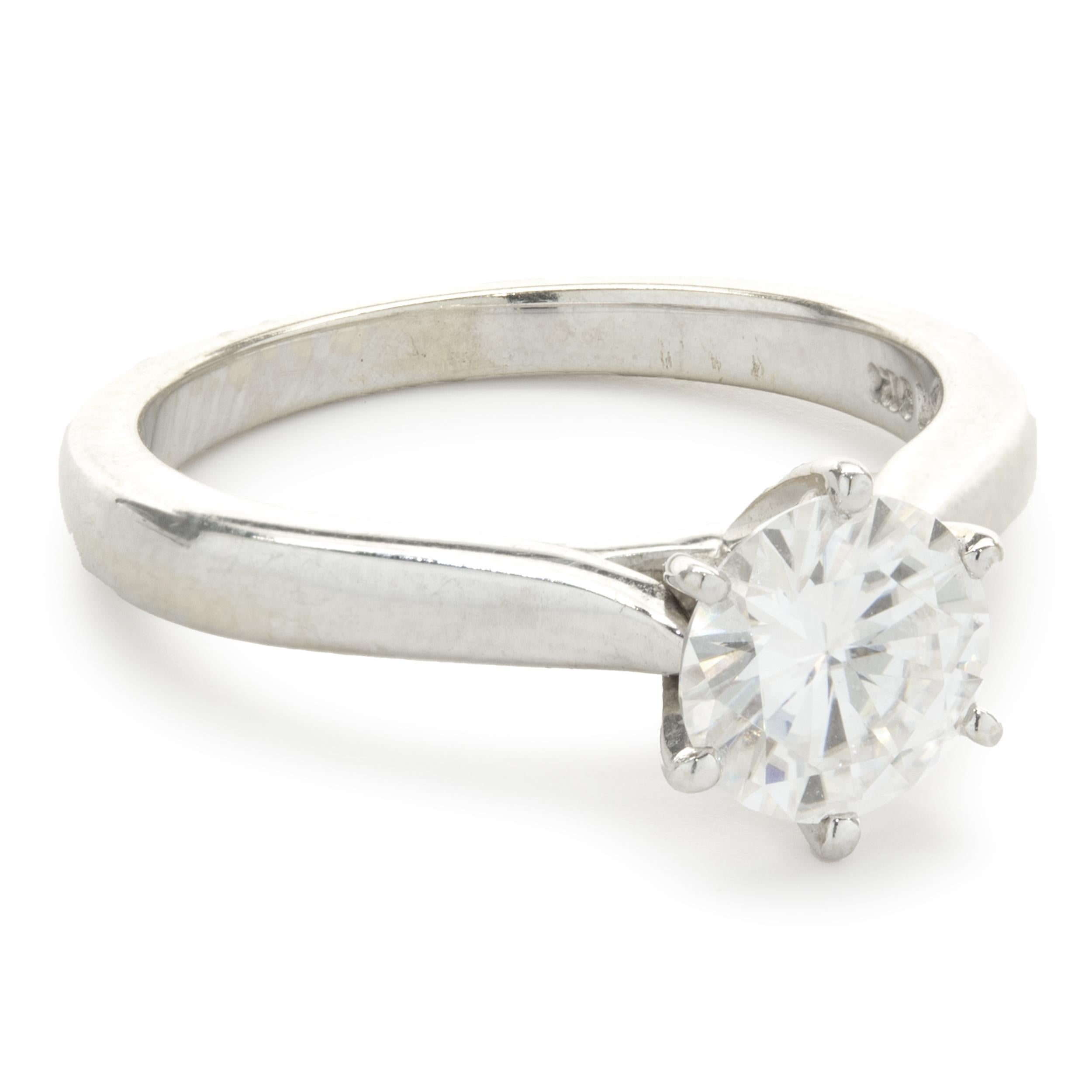 Designer: custom
Material: 14K white gold
Moissonite: 1 round cut = 1.00cttw
Dimensions: ring top measures 7.89mm wide
Ring Size: 5.75 (complimentary sizing available)
Weight: 3.36 grams
