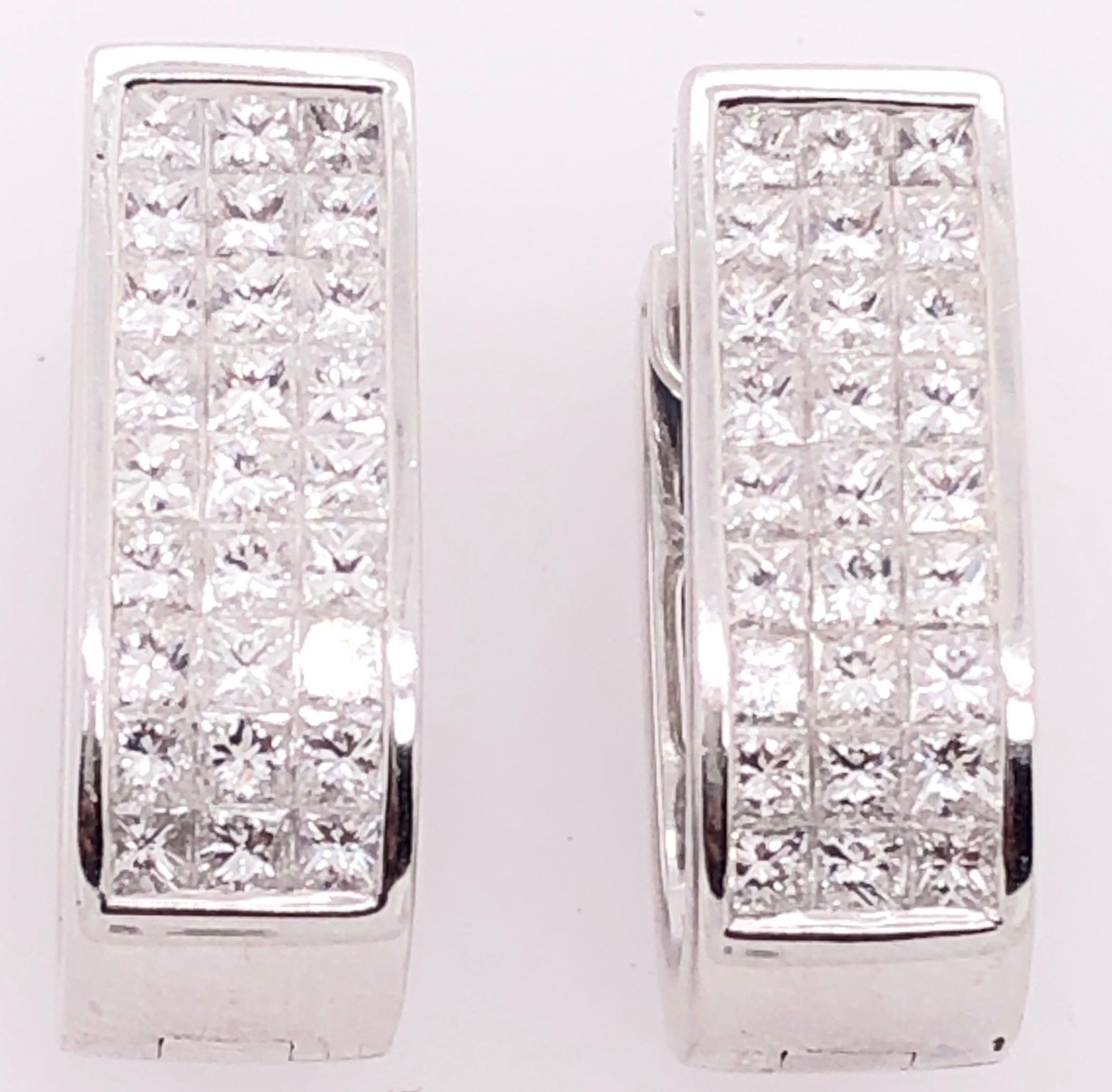 14 Karat White Gold Diamond And Sapphire Reversible Hoop Earrings
1.50 total diamond weight.
5.1 grams total weight.
