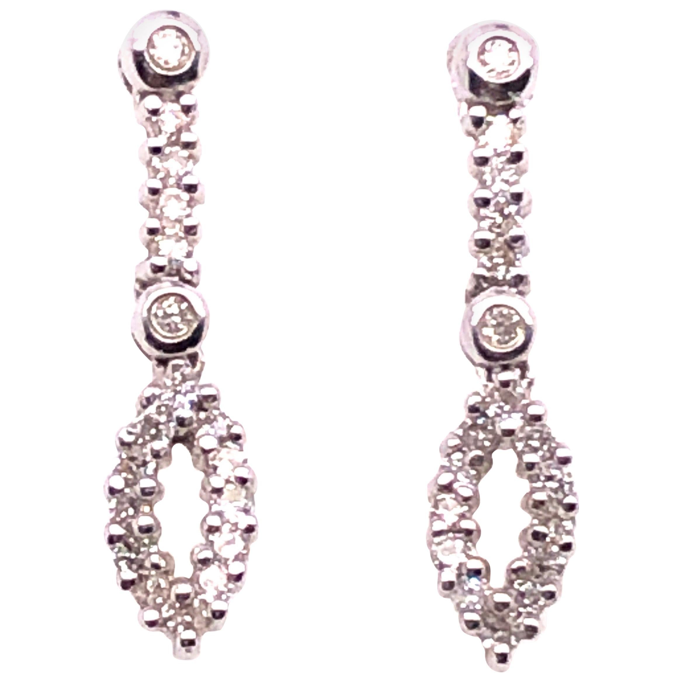 14 Karat White Gold Free Style Diamond Drop / Dangle Earrings