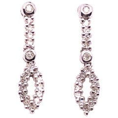14 Karat White Gold Free Style Diamond Drop / Dangle Earrings