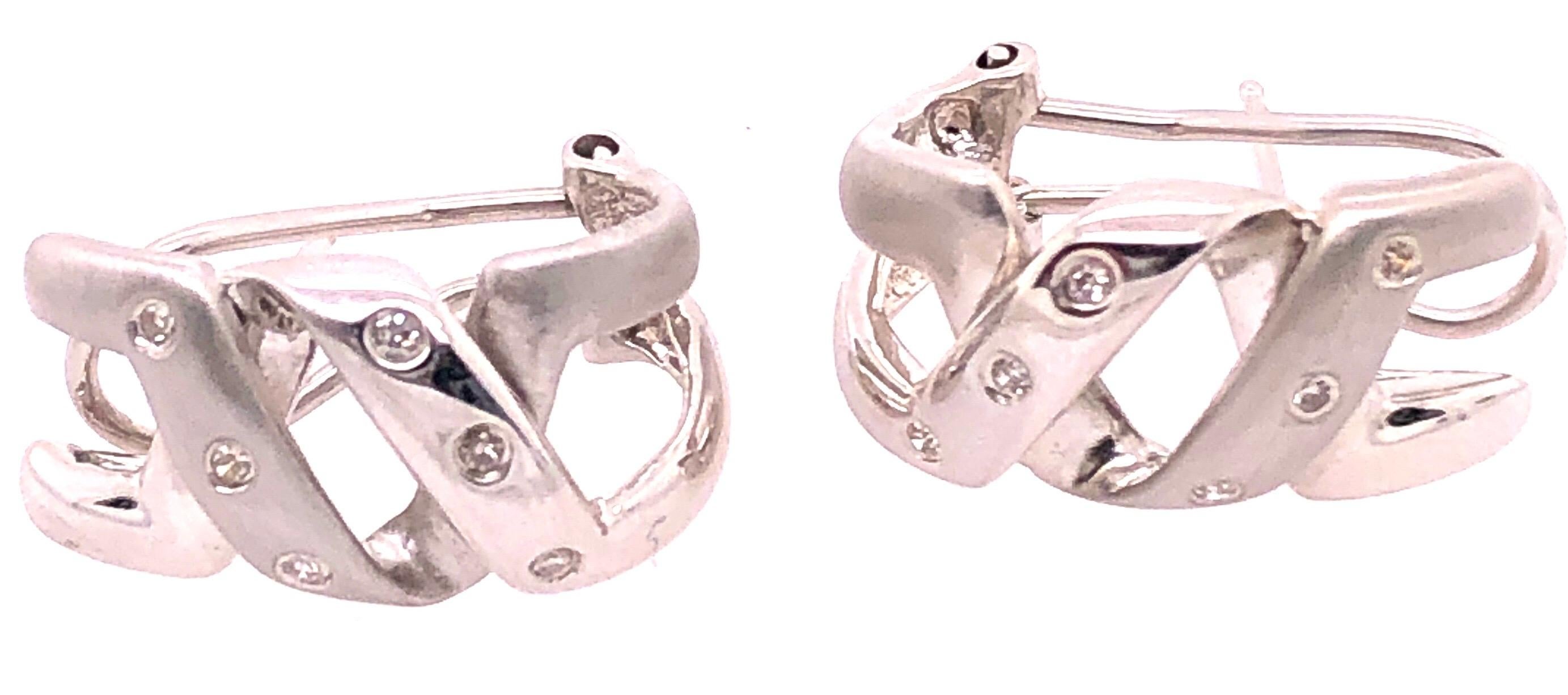 14 Karat White Gold French Back Fashion Earrings with Round Diamonds 0.25 Total Diamond Weight.
6.73 grams total weight.