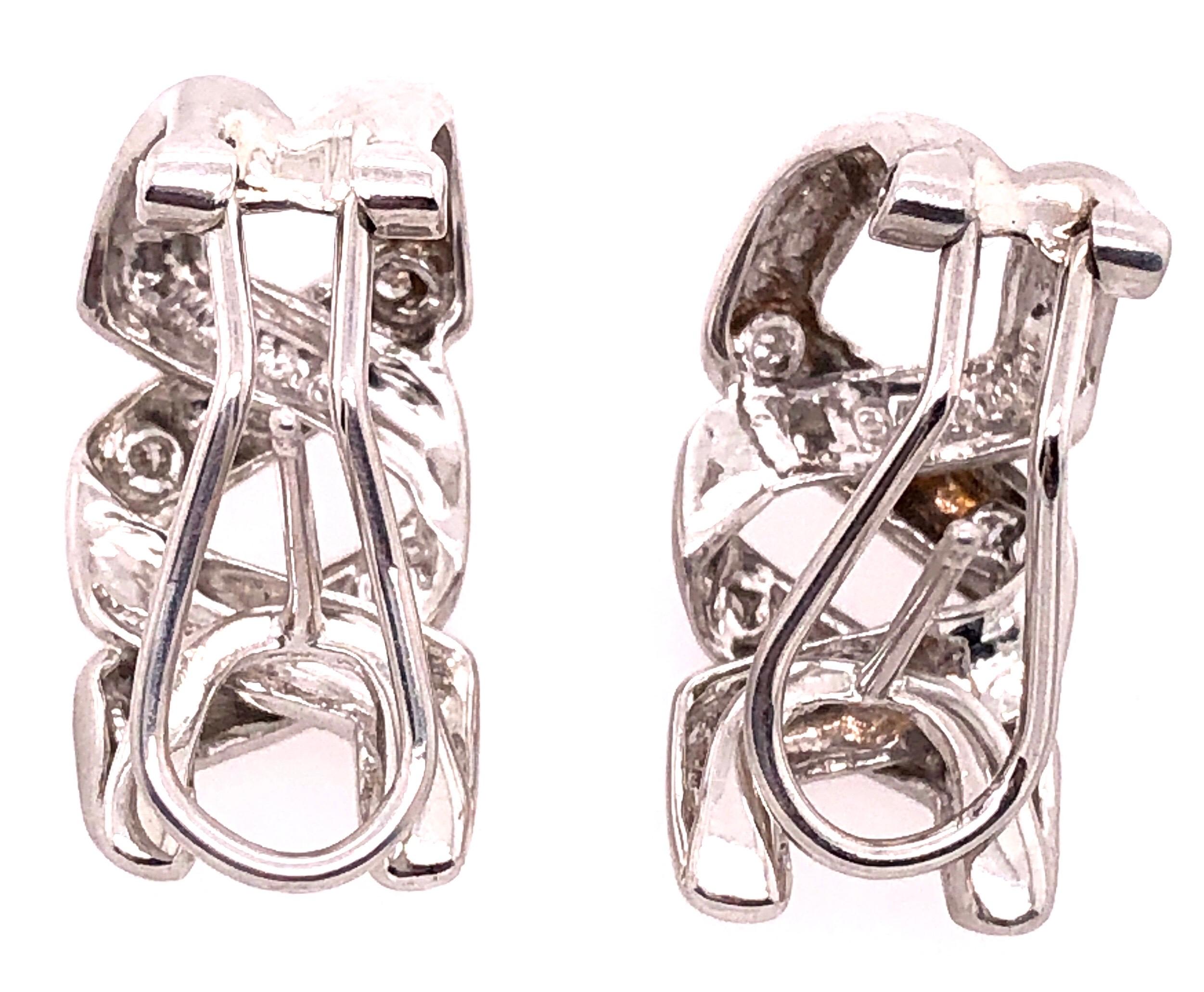 Modern 14 Karat White Gold French Back Fashion Earrings with Round Diamonds 0.25 TDW For Sale