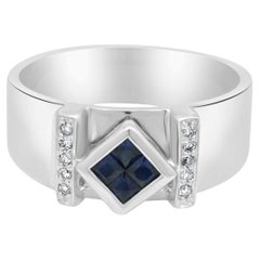 14 Karat White Gold French Cut Blue Sapphire and Round Diamond Ring