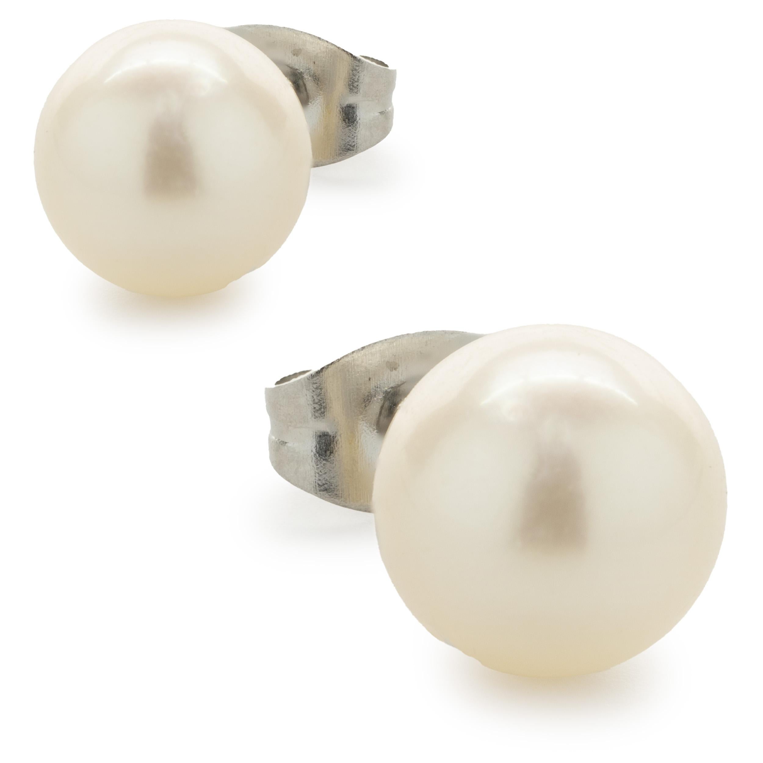 Designer: custom designed
Material: 14K white gold
Dimensions: earrings measure 8mm wide
Weight: 1.85 grams