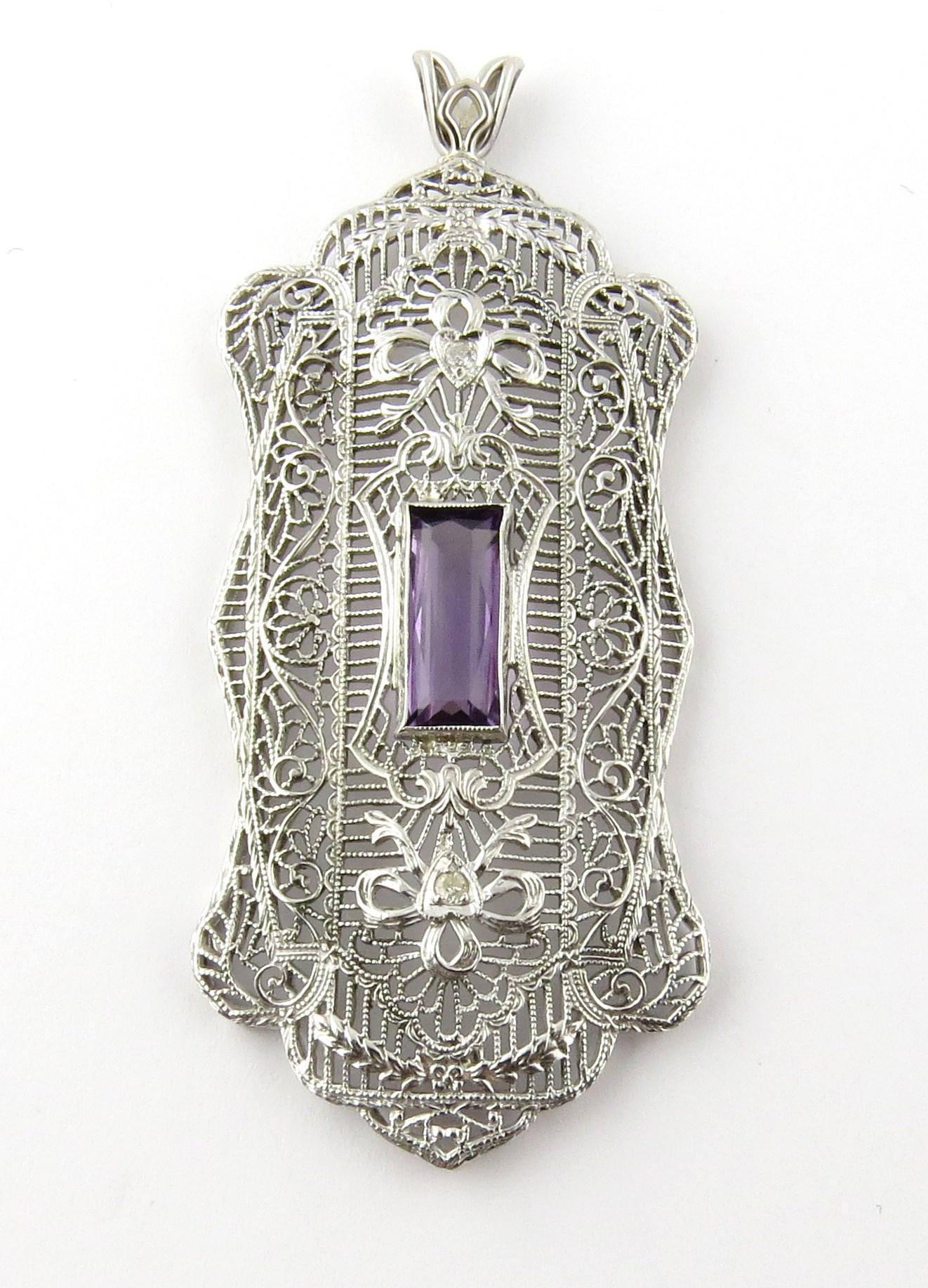 Vintage 14K White Gold Genuine Amethyst and Diamond Filigree Pendant 

This large elegantly detailed pendant is set with a rectangular amethyst stone. The stone is in excellent condition and approximately 11/16