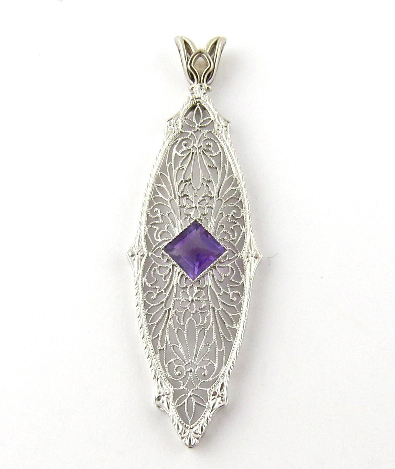 Vintage 14K White Gold Genuine Amethyst Filigree Pendant

This pendant is milgrain set with a square amethyst approx. 5mm in diameter.
Amethyst is a beautiful bright purple.

Princess cut amethyst .54 cts
Color: purple
Clarity: AAA

Pendant hangs 2